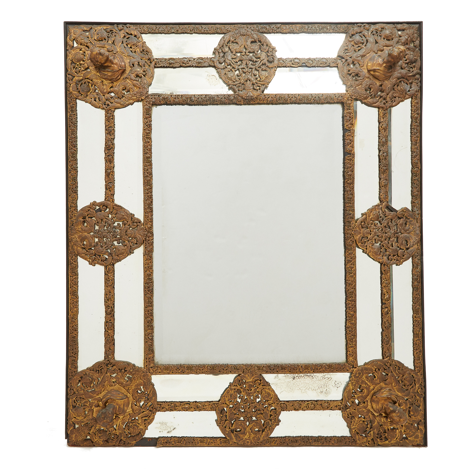 Large North Italian Gilt Bronze and Repoussé Mirror Framed Cushion Mirror, probably Venice, 18th century