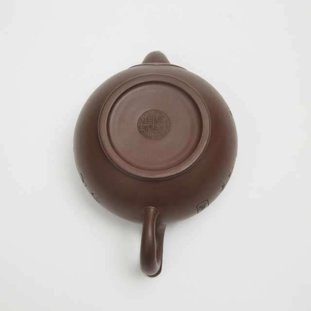 A Chinese Yixing Pottery Tea Set