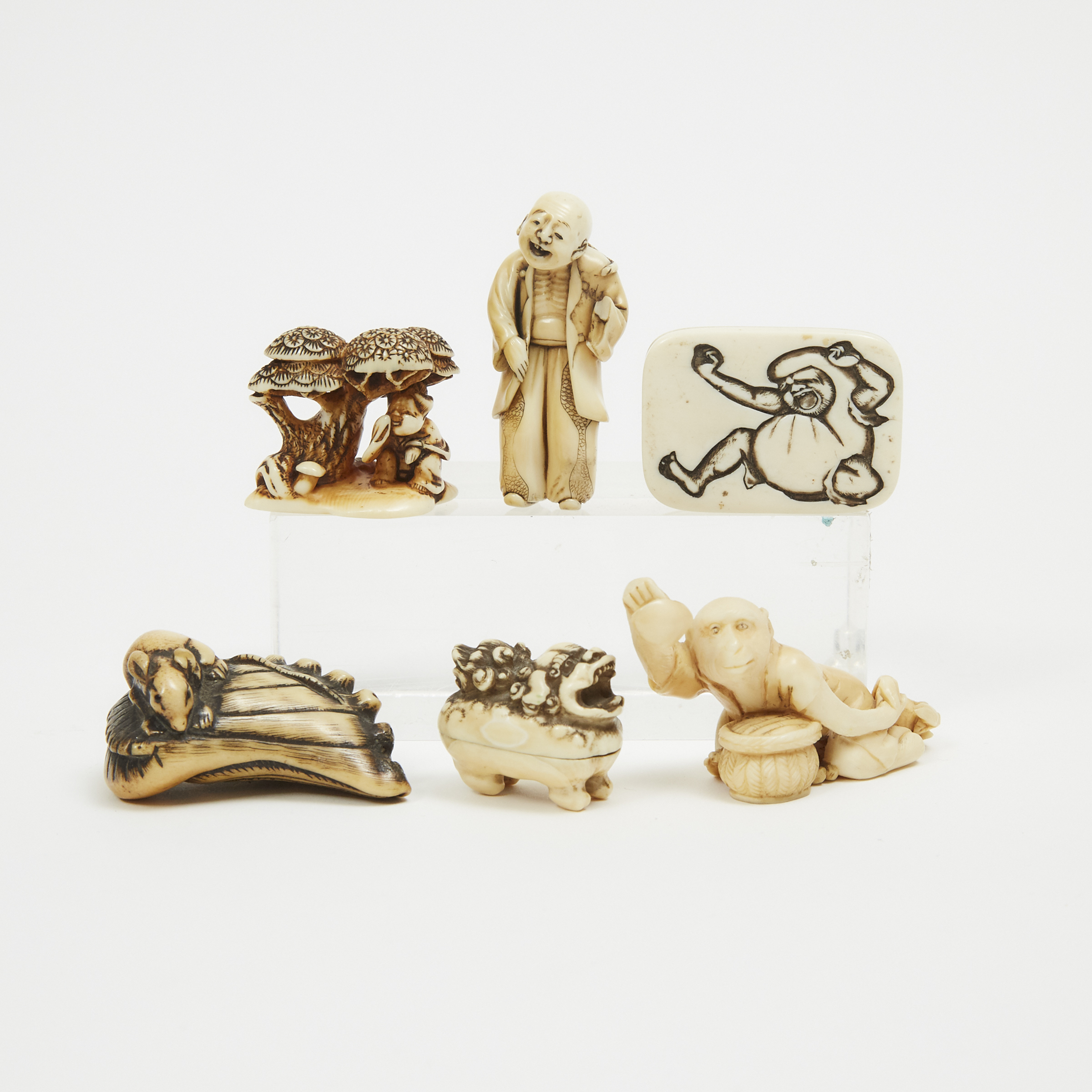 A Group of Six Ivory and Antler Netsuke, 19th/Early 20th Century