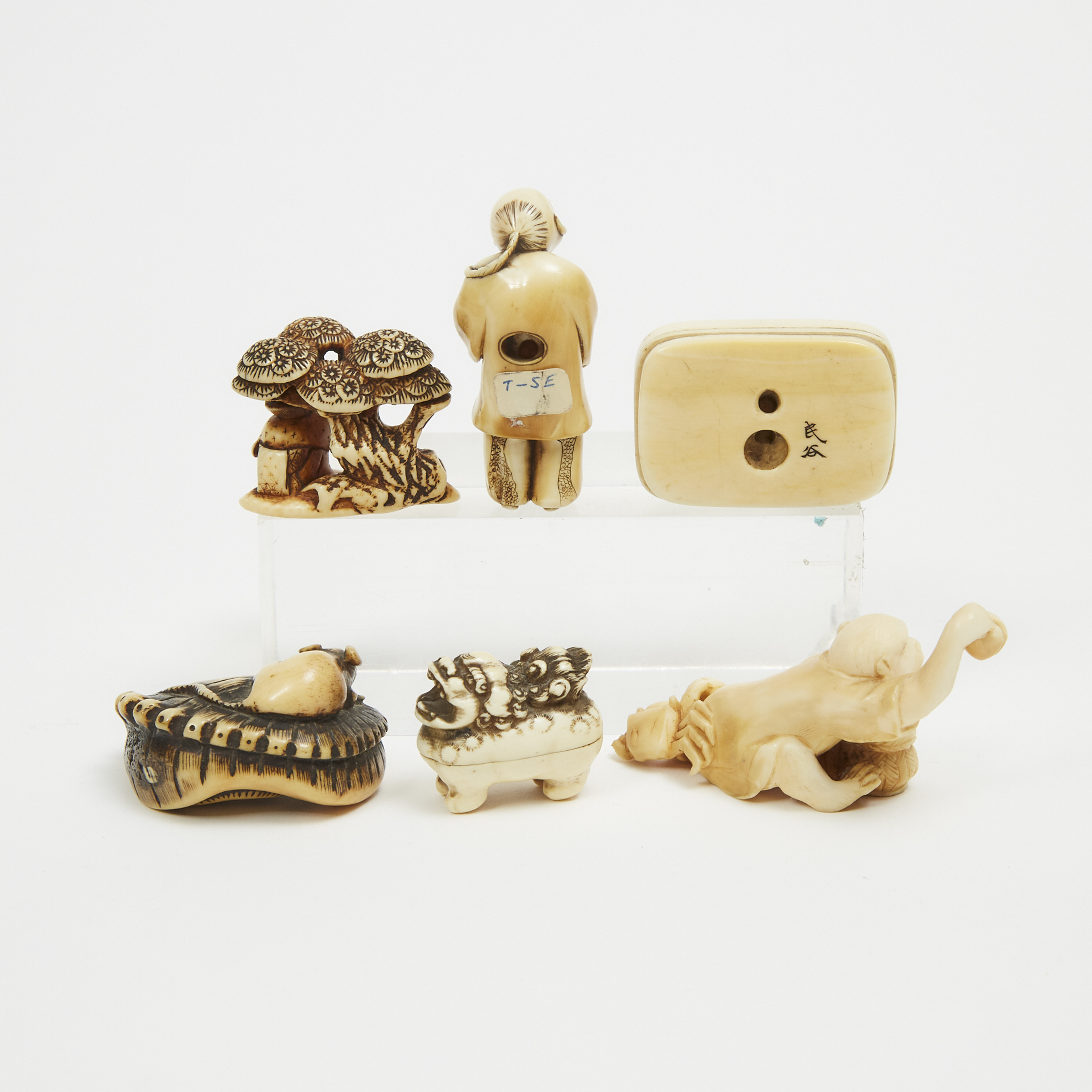 A Group of Six Ivory and Antler Netsuke, 19th/Early 20th Century