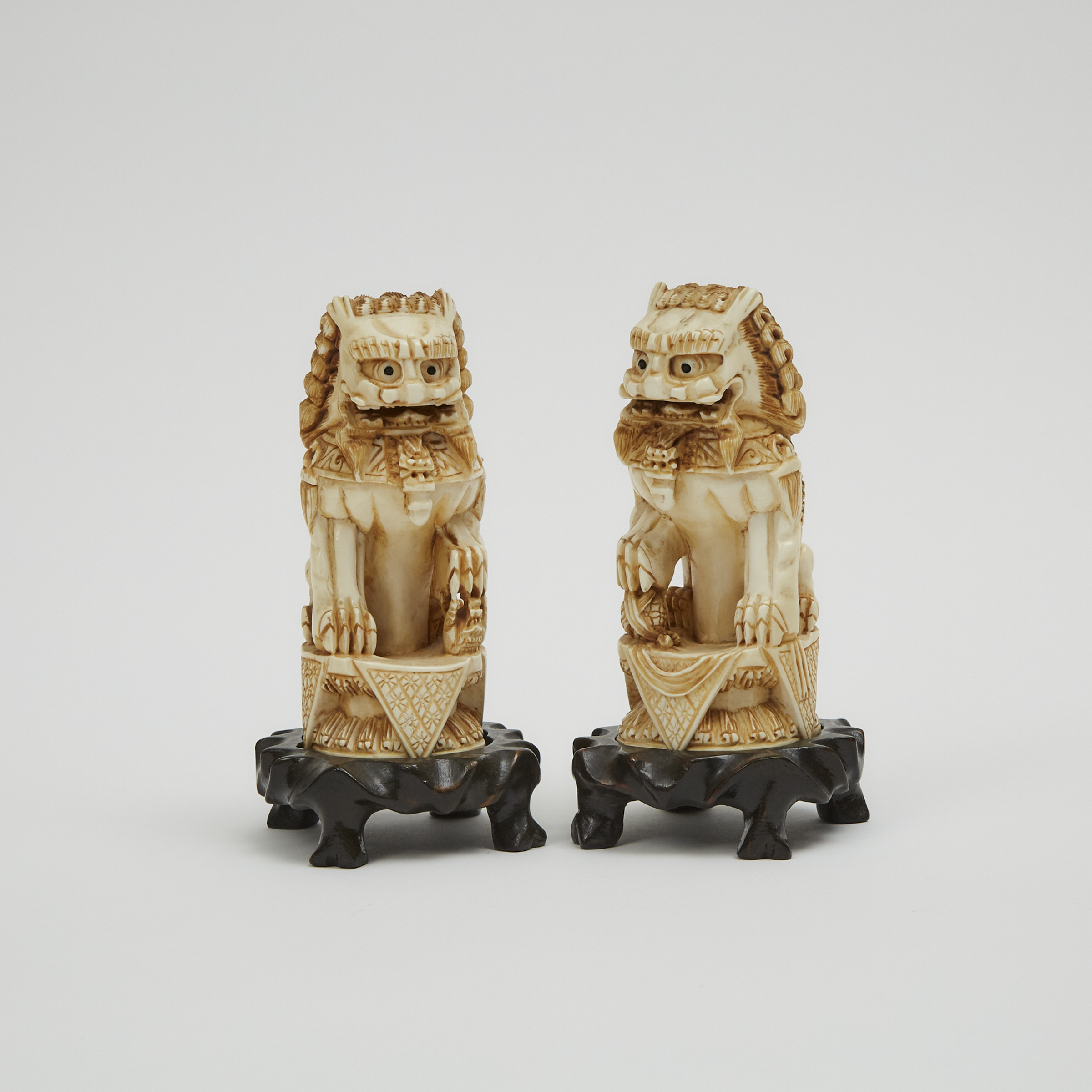 A Pair of Chinese Ivory Carved Lions, Circa 1940