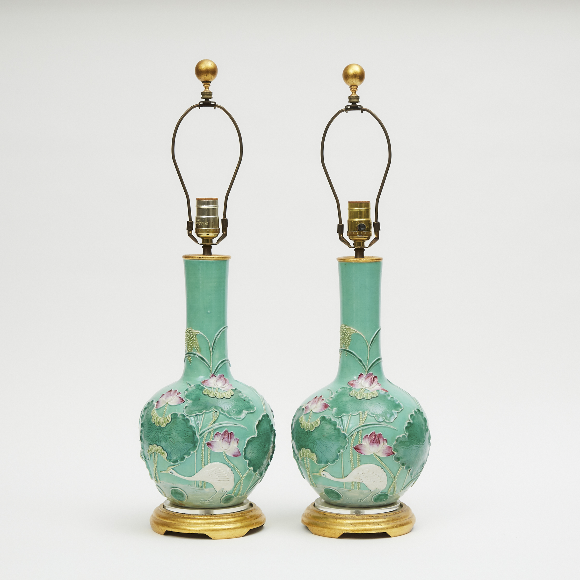 A Pair of Moulded Porcelain 'Cranes and Lotus' Vase Lamps