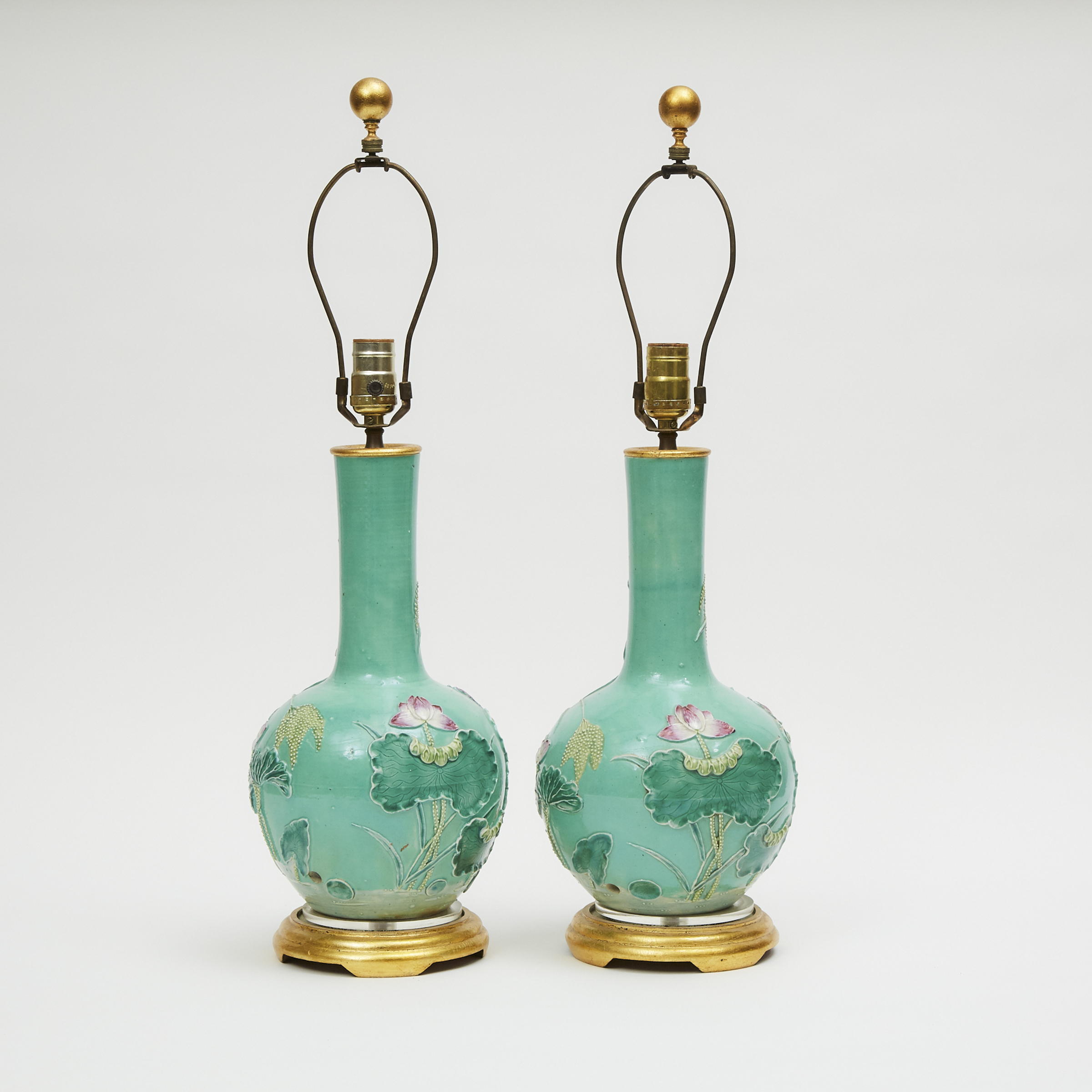 A Pair of Moulded Porcelain 'Cranes and Lotus' Vase Lamps