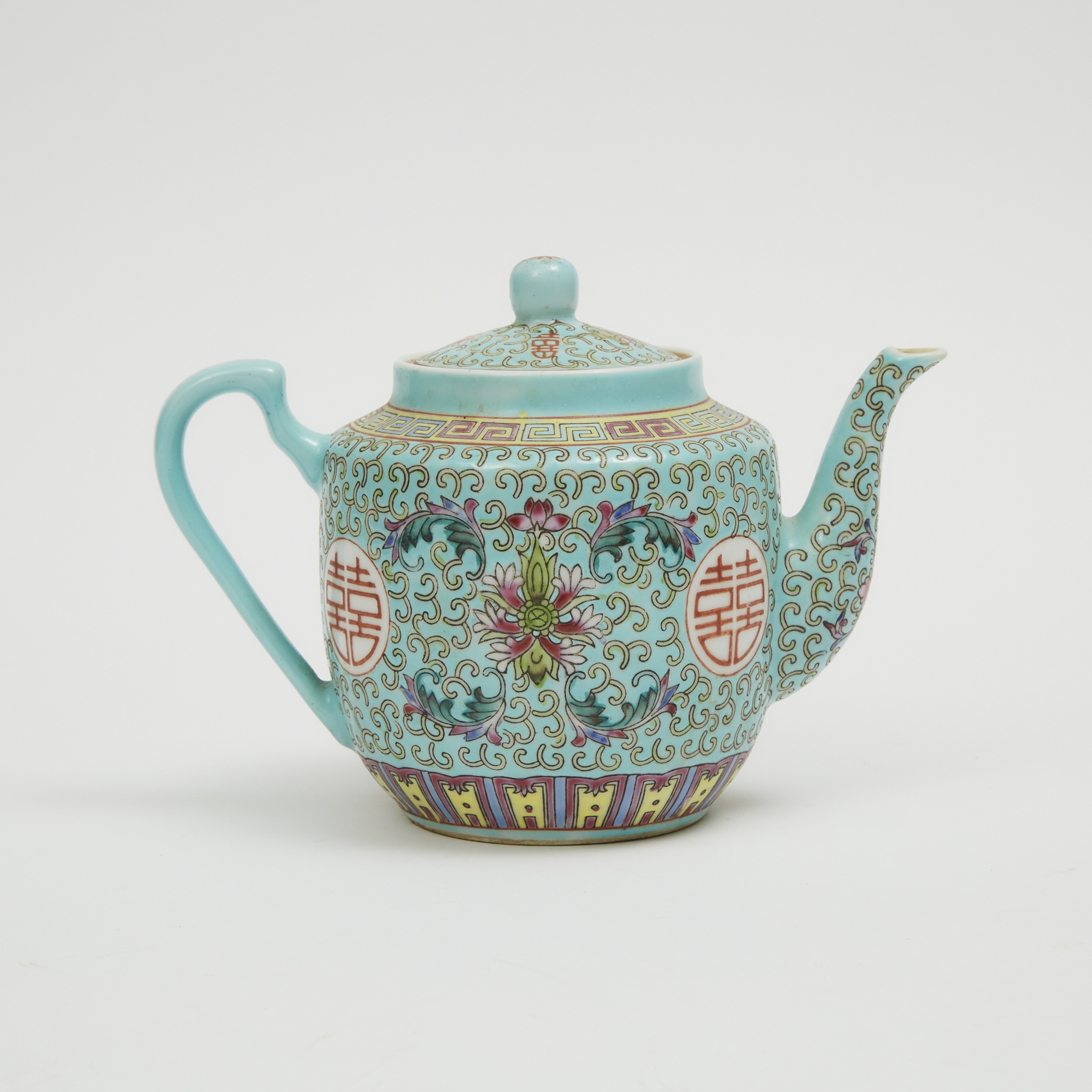 A Turquoise Ground Famille Rose Teapot