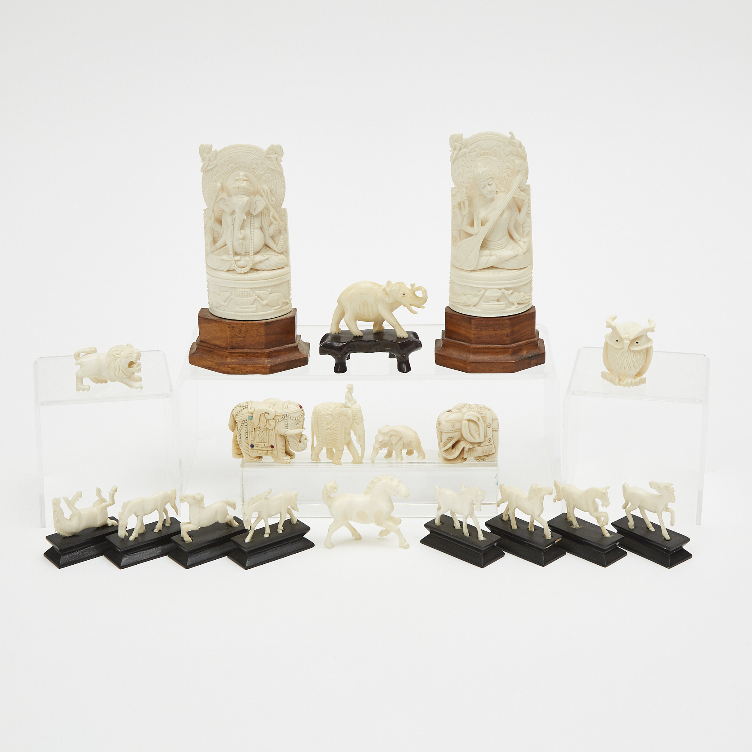A Group of Eighteen Ivory Carved Figures