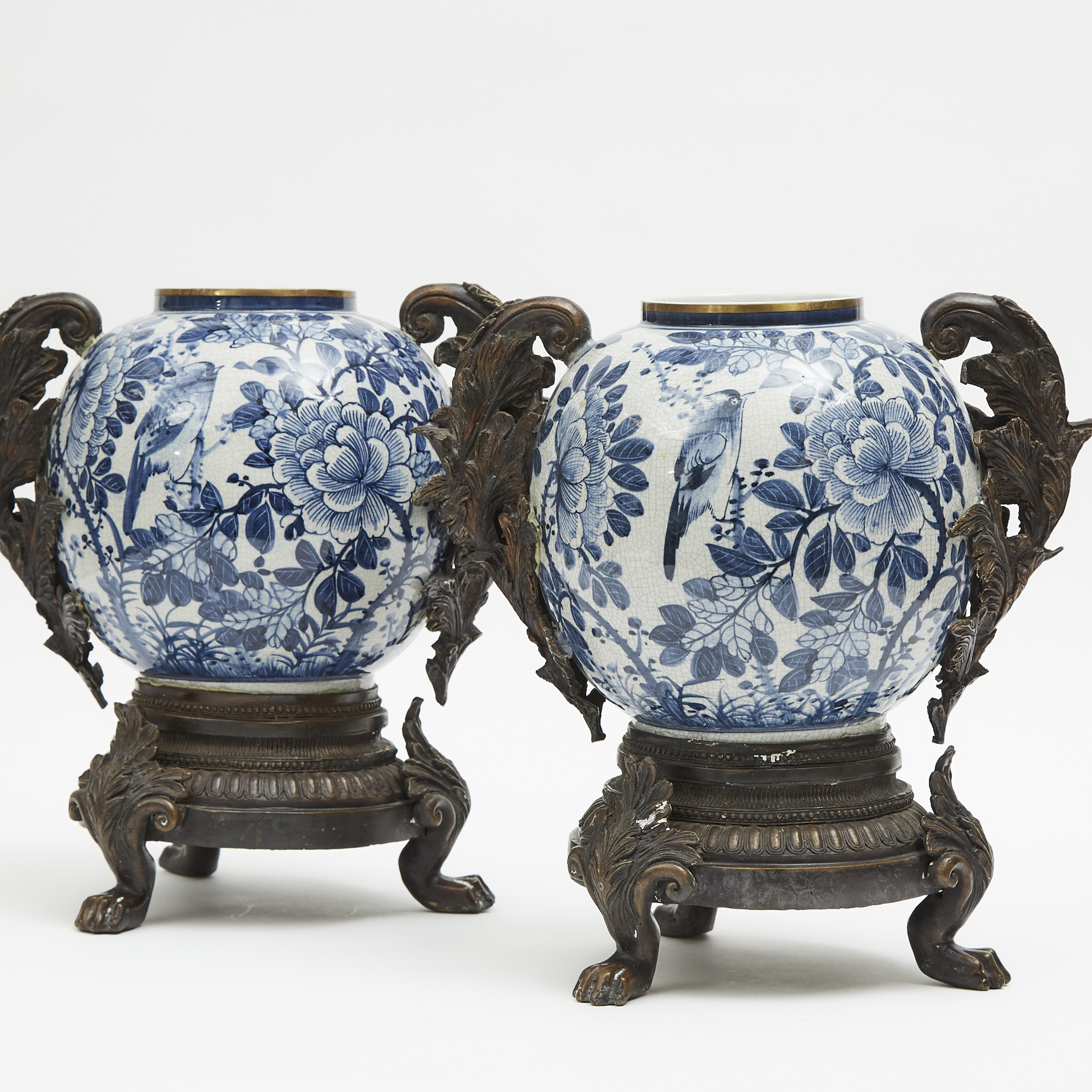 A Pair of Bronze Mounted Blue and White Vases