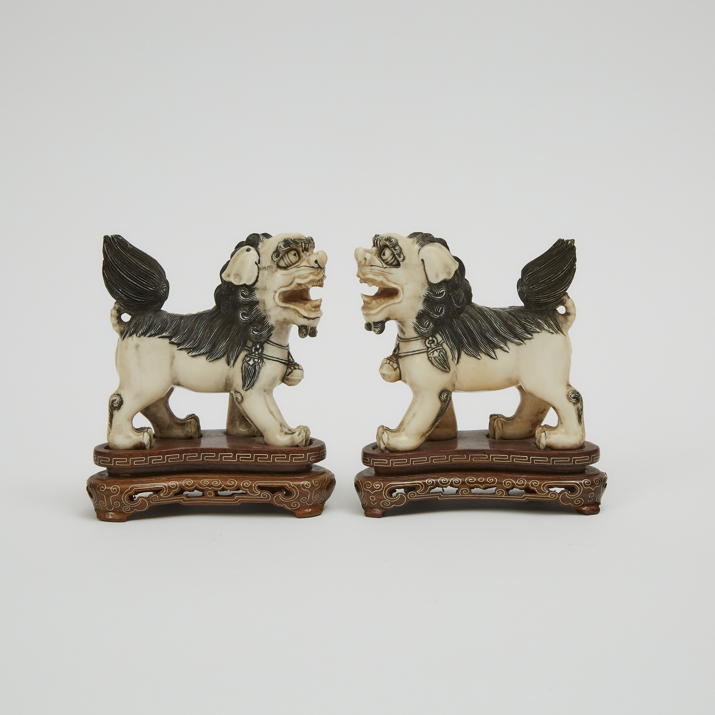 A Pair of Ivory Foo Dogs, Circa 1940