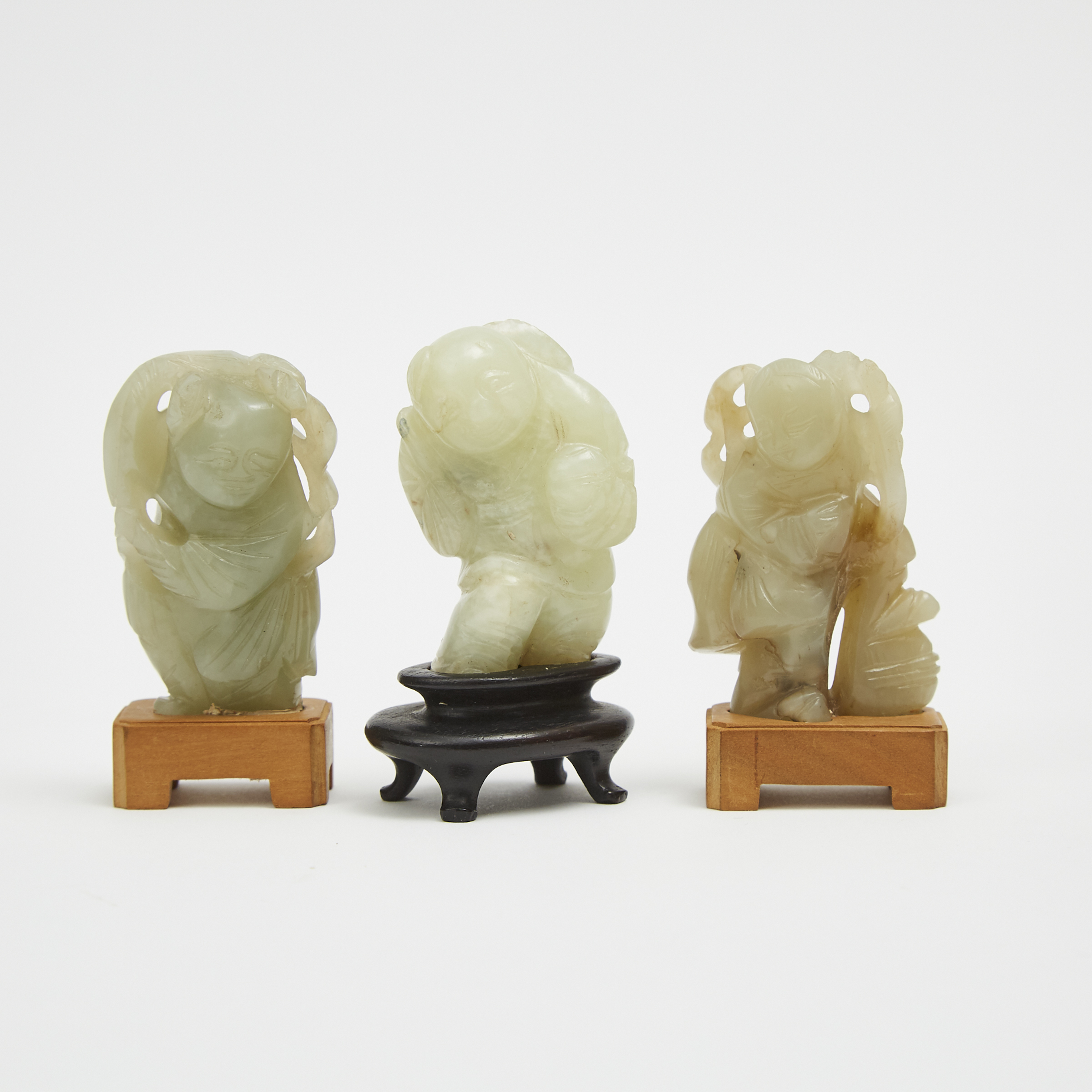 A Group of Three Jade Carved Figures