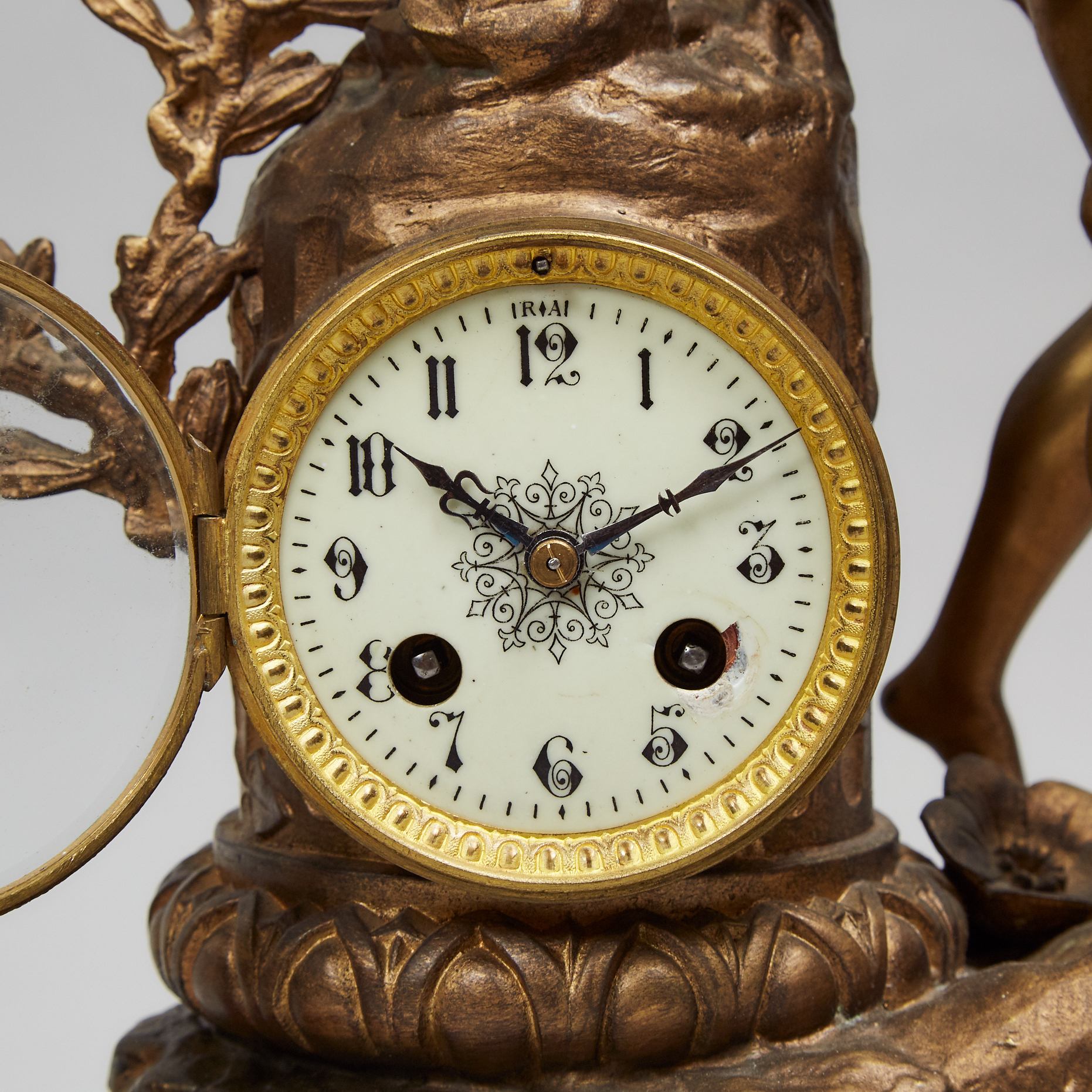 French Gilt Metal and Rouge Griotte Marble Three Piece Clock Garniture, c.1900