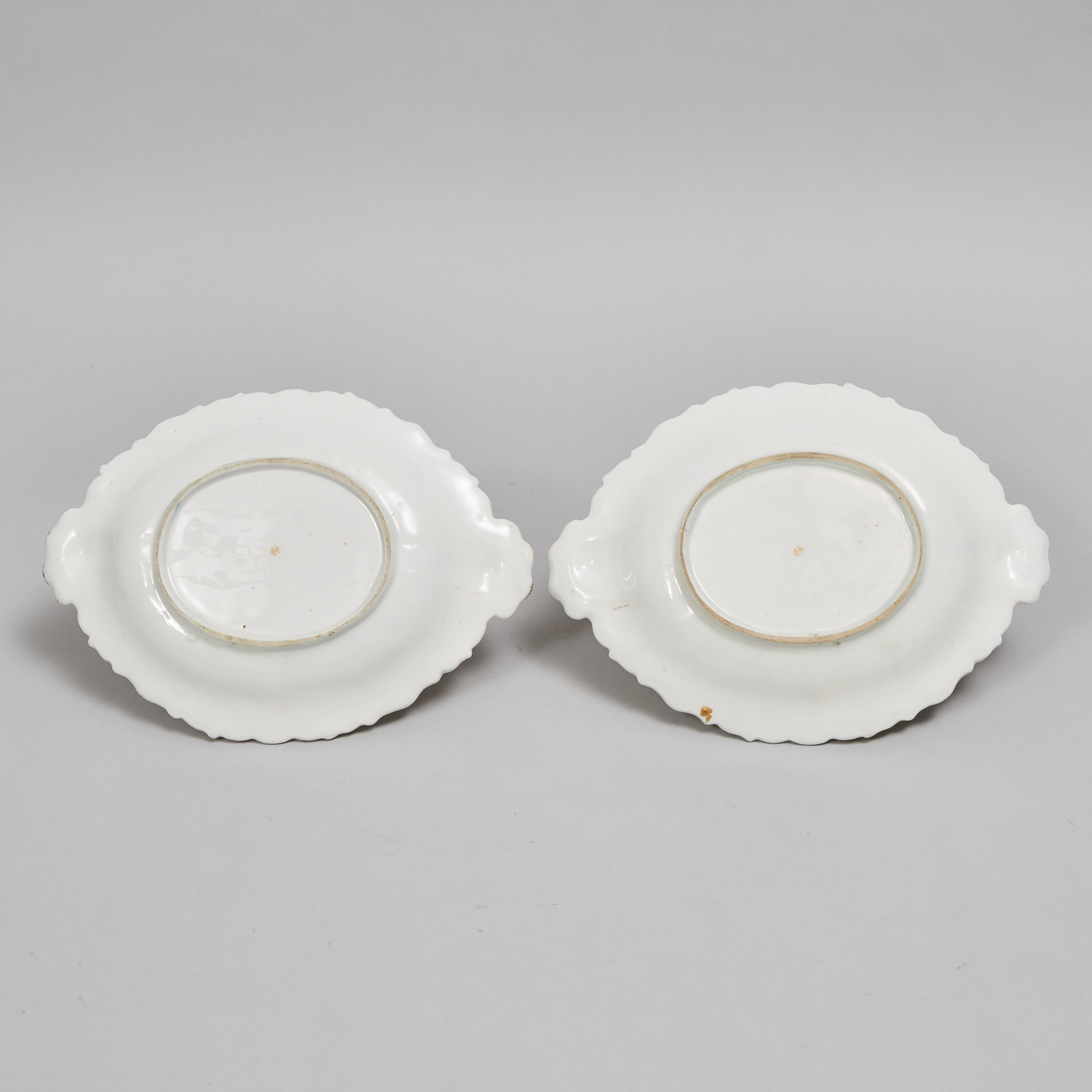 Pair of Chelsea Flower Painted Blue and Gilt Paneled Shaped and Moulded Oval Dishes, c.1760