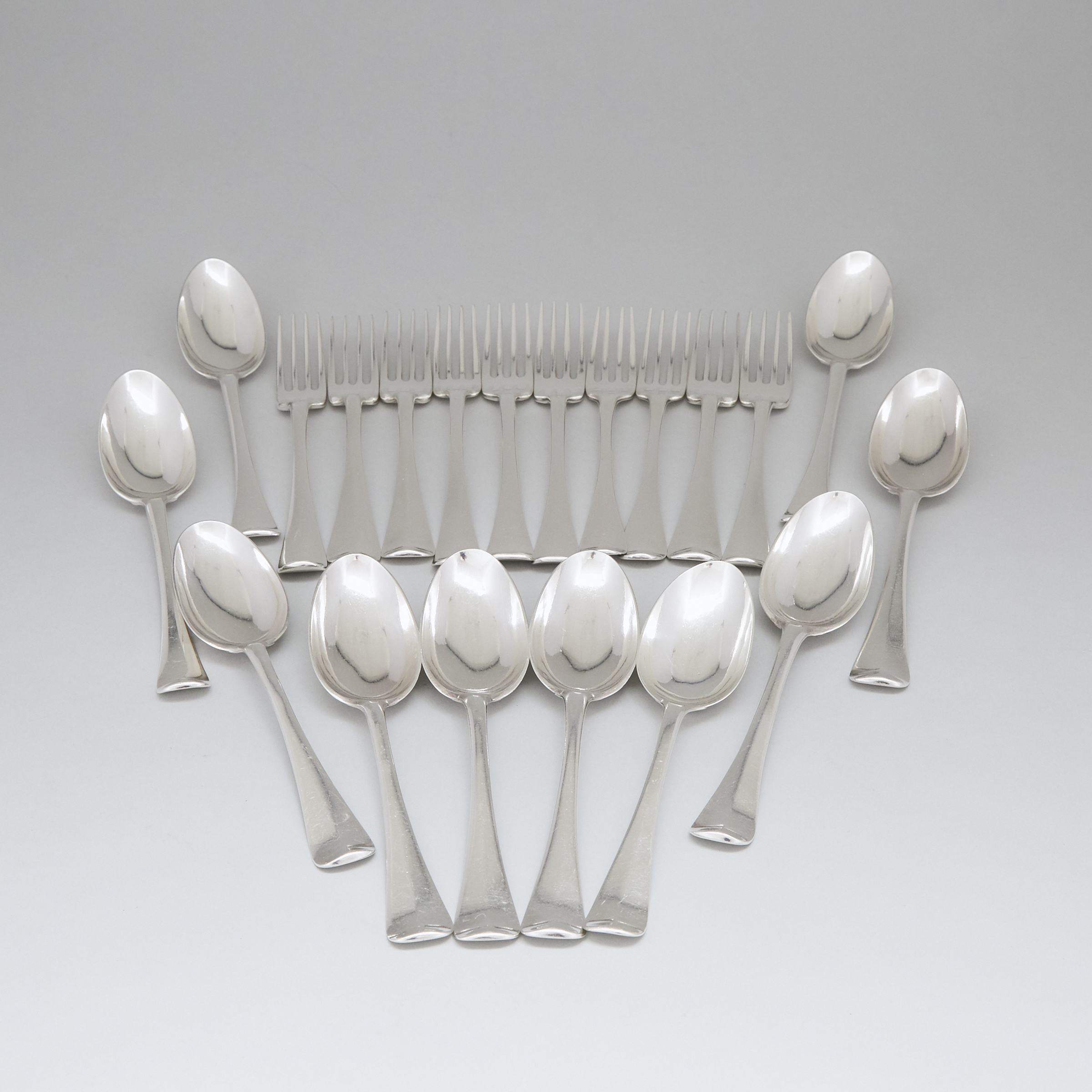 Ten Dutch Silver Hanoverian Pattern Table Spoons and Ten Forks, The Hague, 18th century