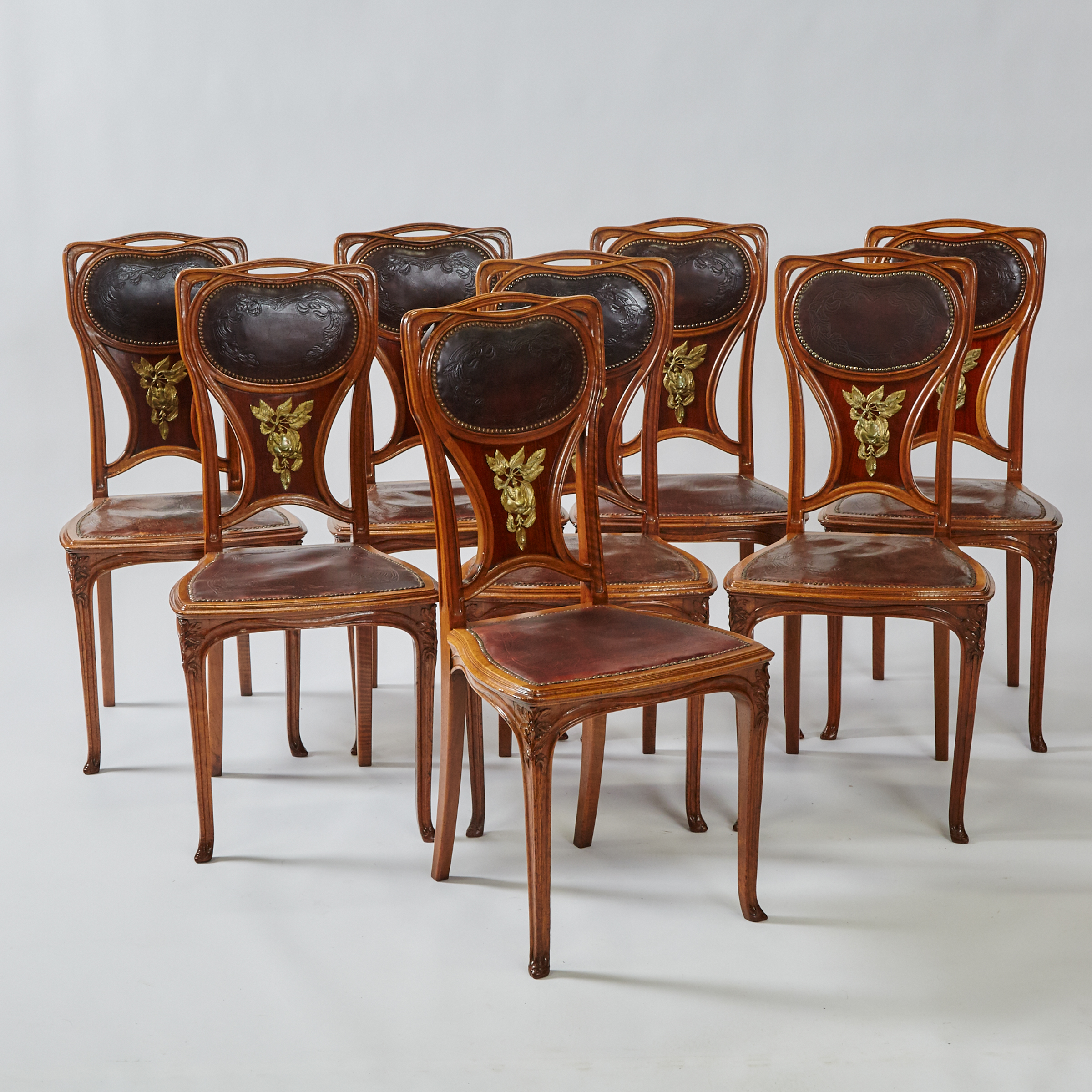 Set of Eight Louis Majorelle French Art Nouveau Ormolu Mounted Walnut and Rosewood Dining Chairs, 19th/early 19th century