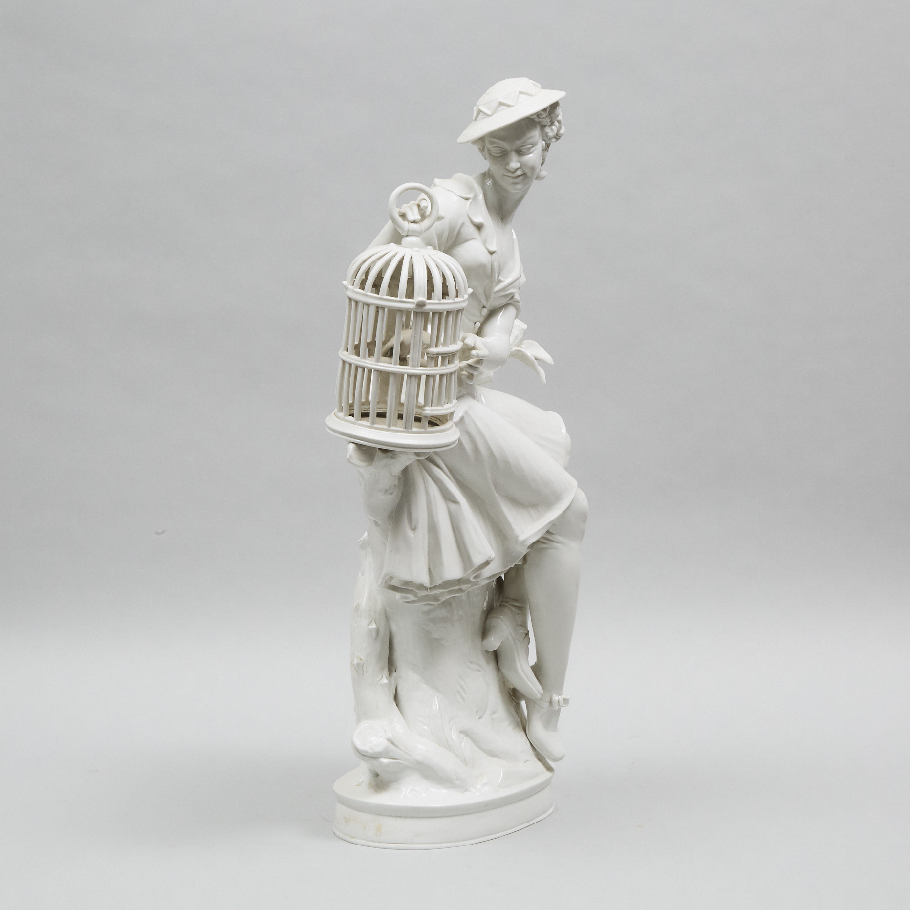 Rosenthal White Glazed Large Figure, 'Vöglein Flieg', of a Seated Woman with Caged Bird, Hugo Meisel, mid-20th century