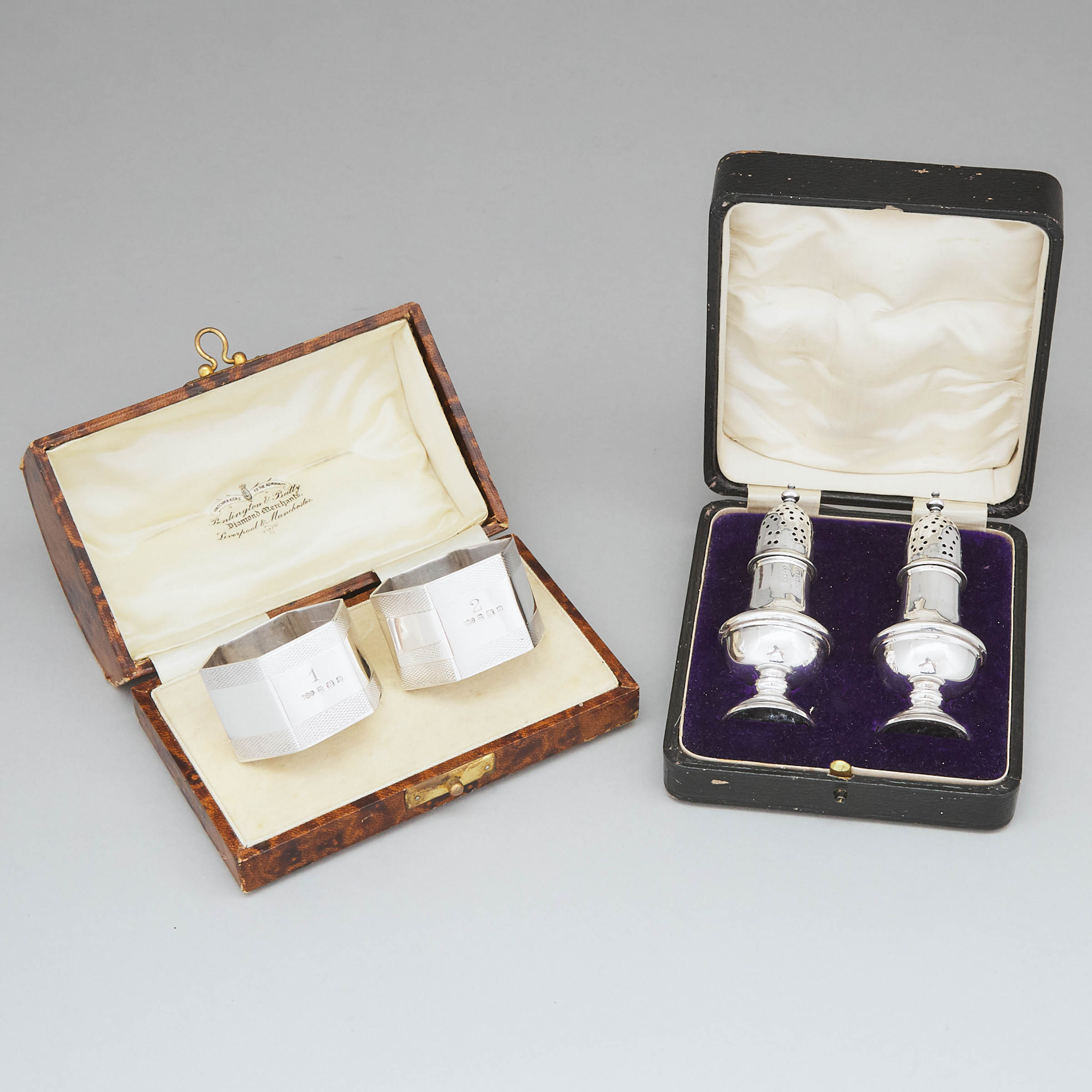 Pair of English Silver Hexagonal Napkin Rings, Henry Clifford Davies, Birmingham, 1934 and a Pair of Pepper Casters, Adie & Lovekin, 1912