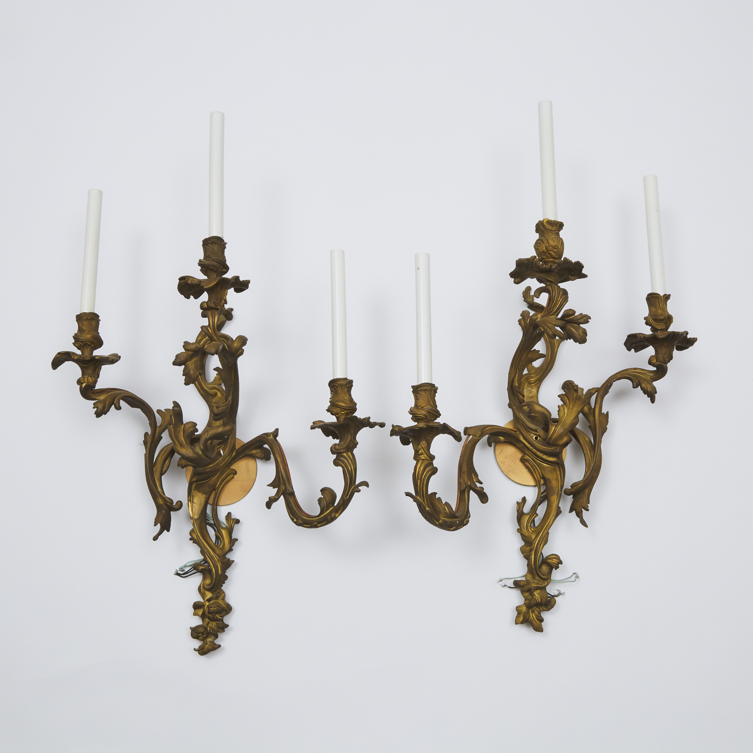 Large Pair of French Louis XV Rococo Style Gilt Bronze Three Light Wall Sconces, late 19th century