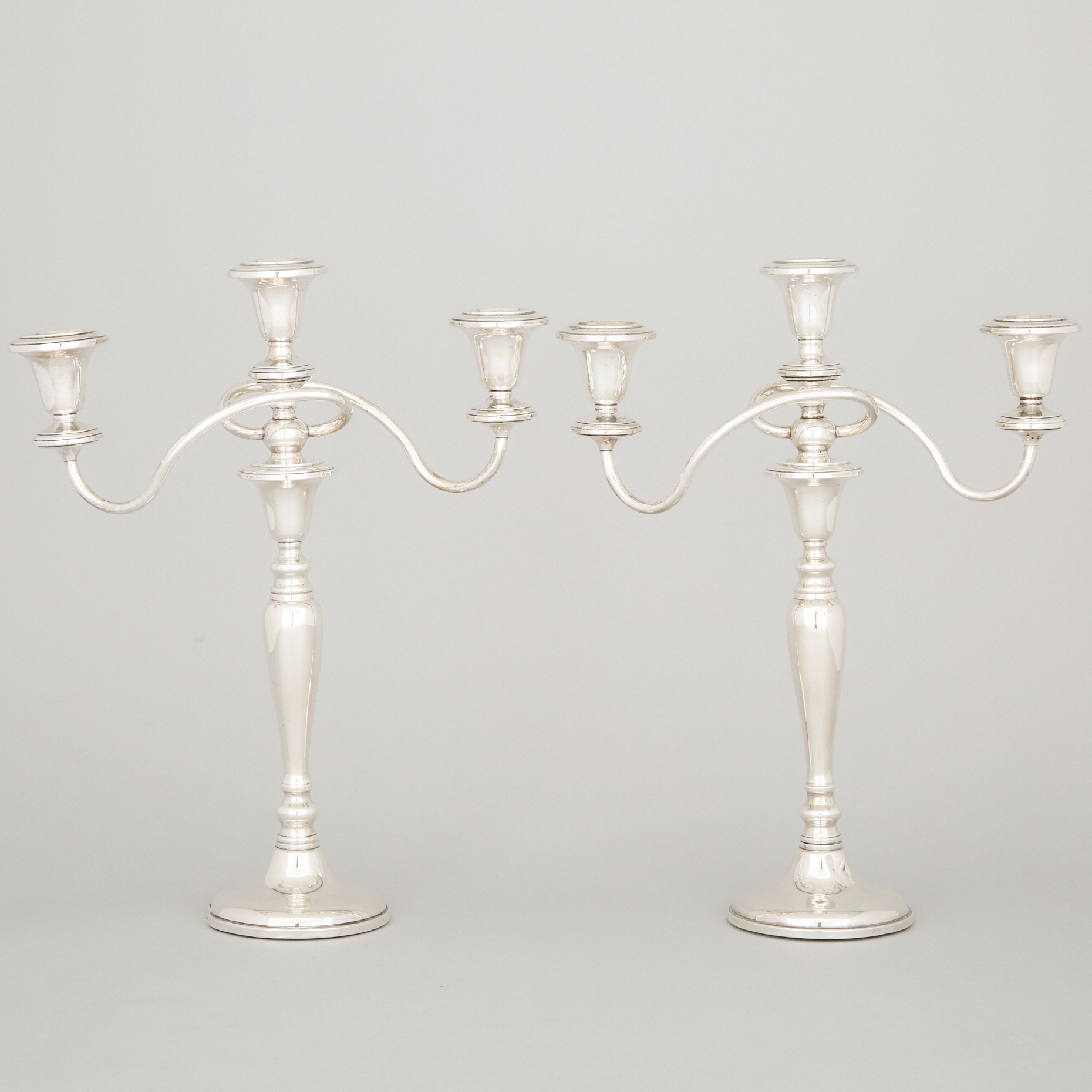 Pair of American Silver Three-Light Candelabra, Revere Silversmiths, Brooklyn, N.Y., 20th century