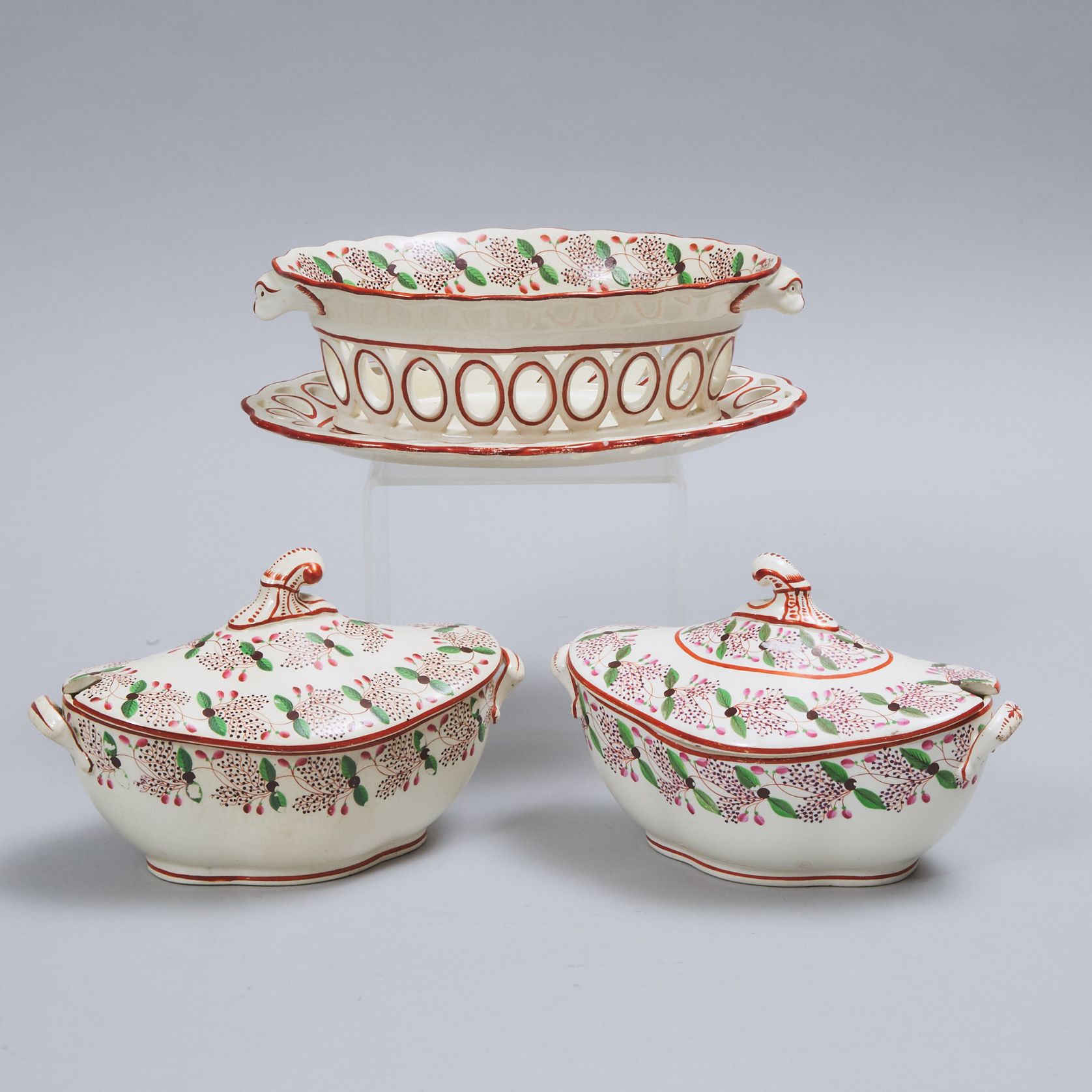 Pair of Spode Creamware Sauce Tureens and an Oval Basket on Stand, c.1810