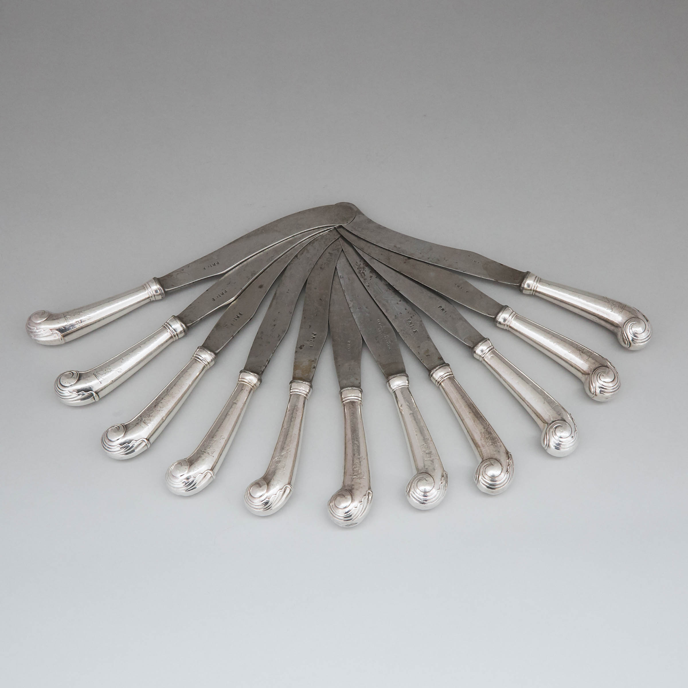 Eleven Georgian Silver Pistol Handled Table Knives, late 18th/early 19th century