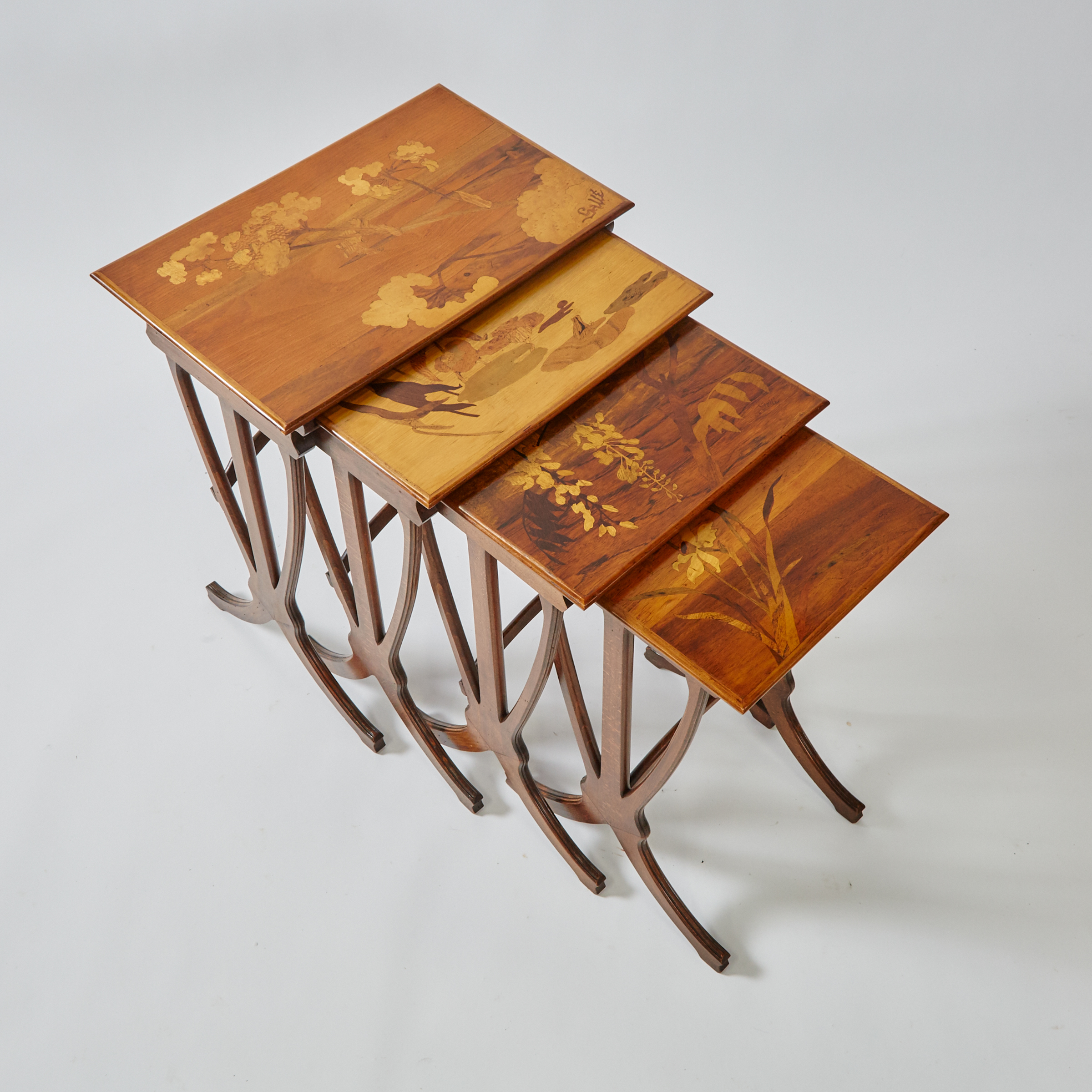 Set of Four Émile Gallé French Art Nouveau Mixed Wood Marquetry Inlaid Nesting Tables, 19th/early 20th century