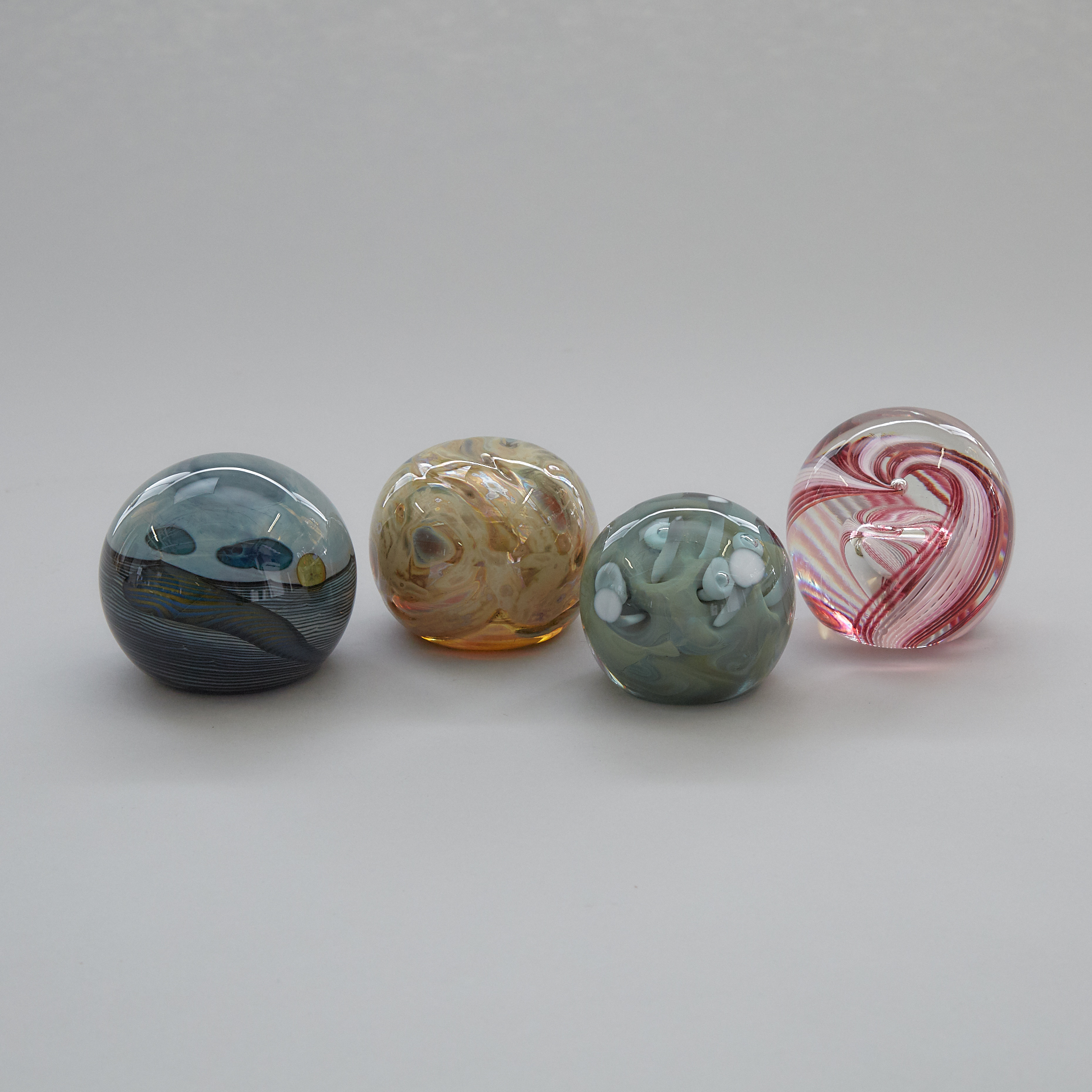 Four Various Glass Paperweights, 20th century