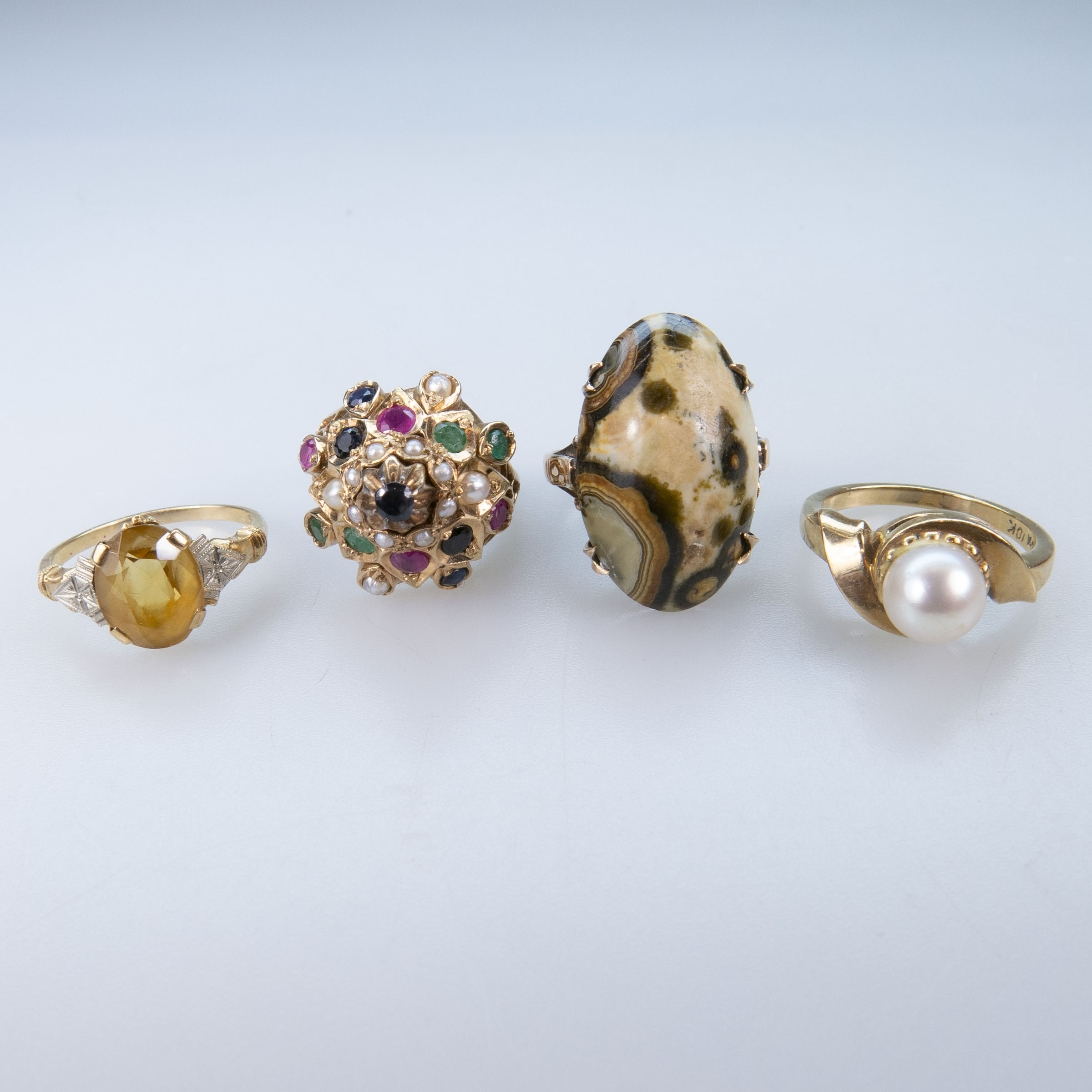 1 x 18k, 1 x 14k, And 2 x 10k Yellow Gold Rings