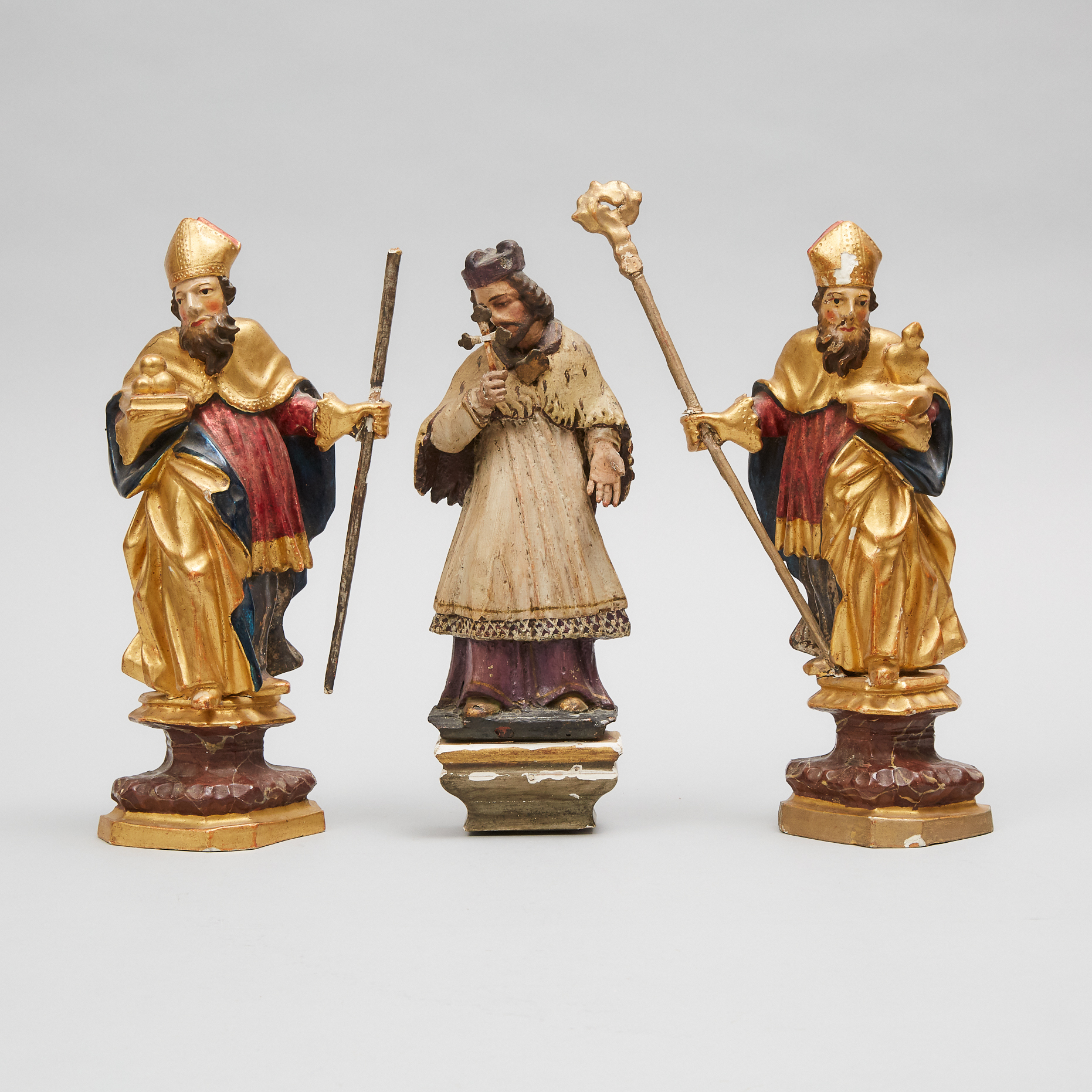 Three South German Polychromed Figures of Saints, 20th century