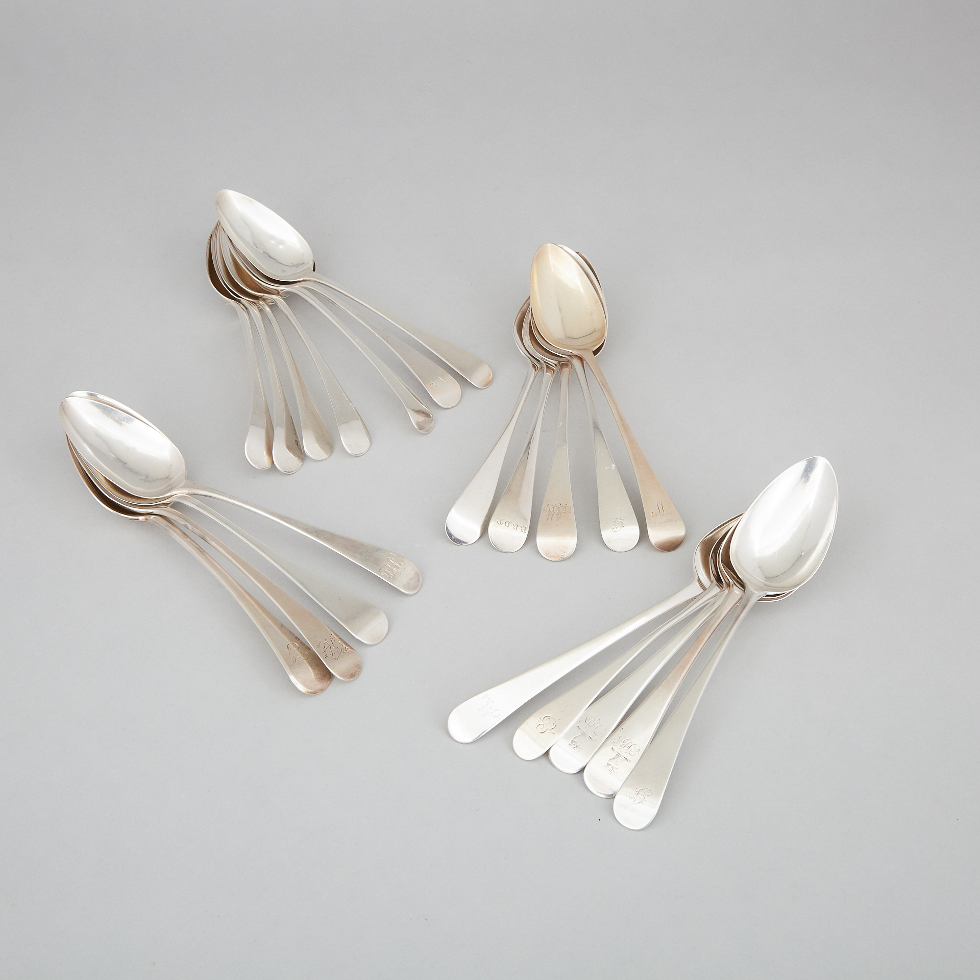 Twenty-One George III Silver Old English Pattern Table Spoons, mainly London, late 18th/early 19th century