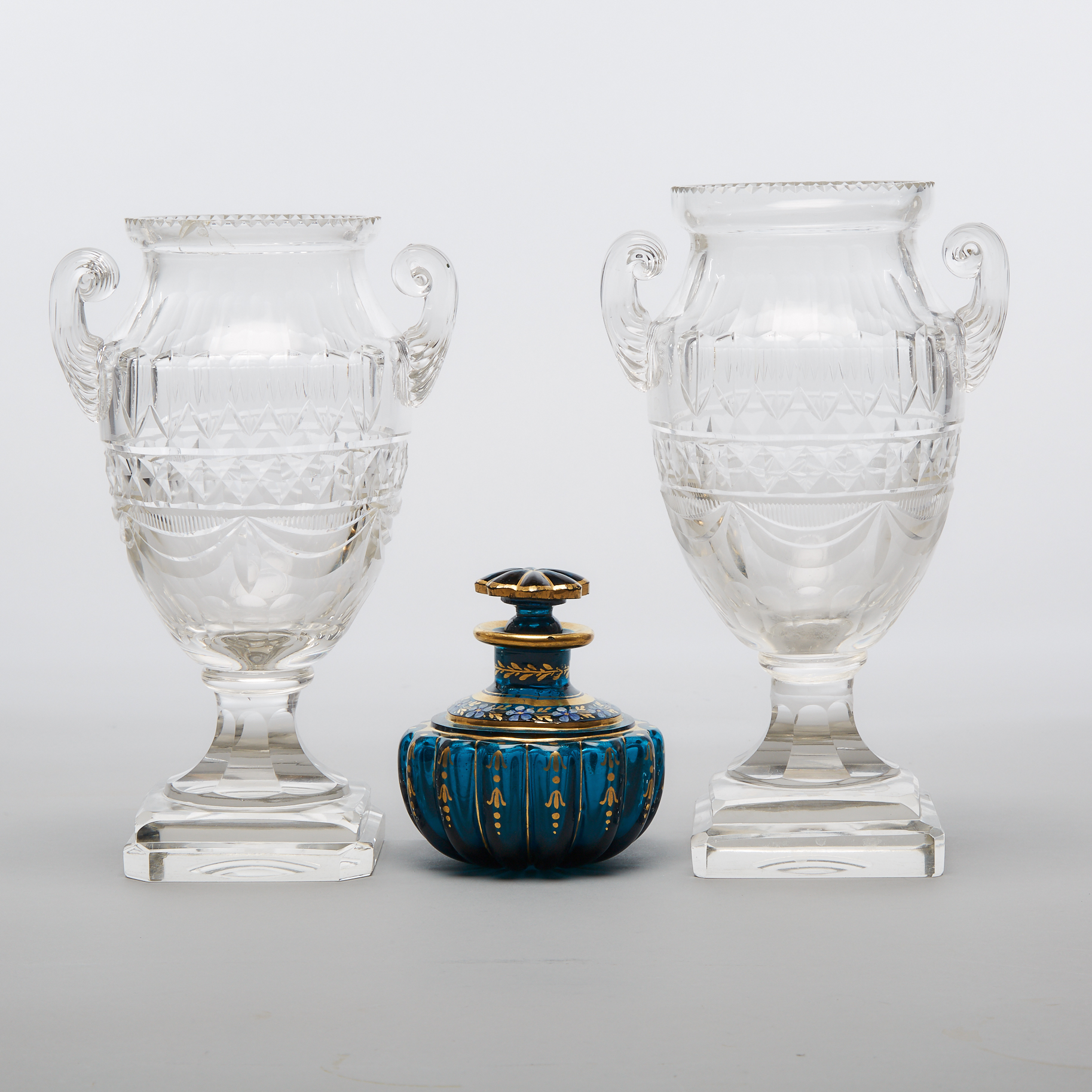 Pair of Continental Cut Glass Vases and an Enameled and Gilt Blue Glass Perfume Bottle, late 19th century