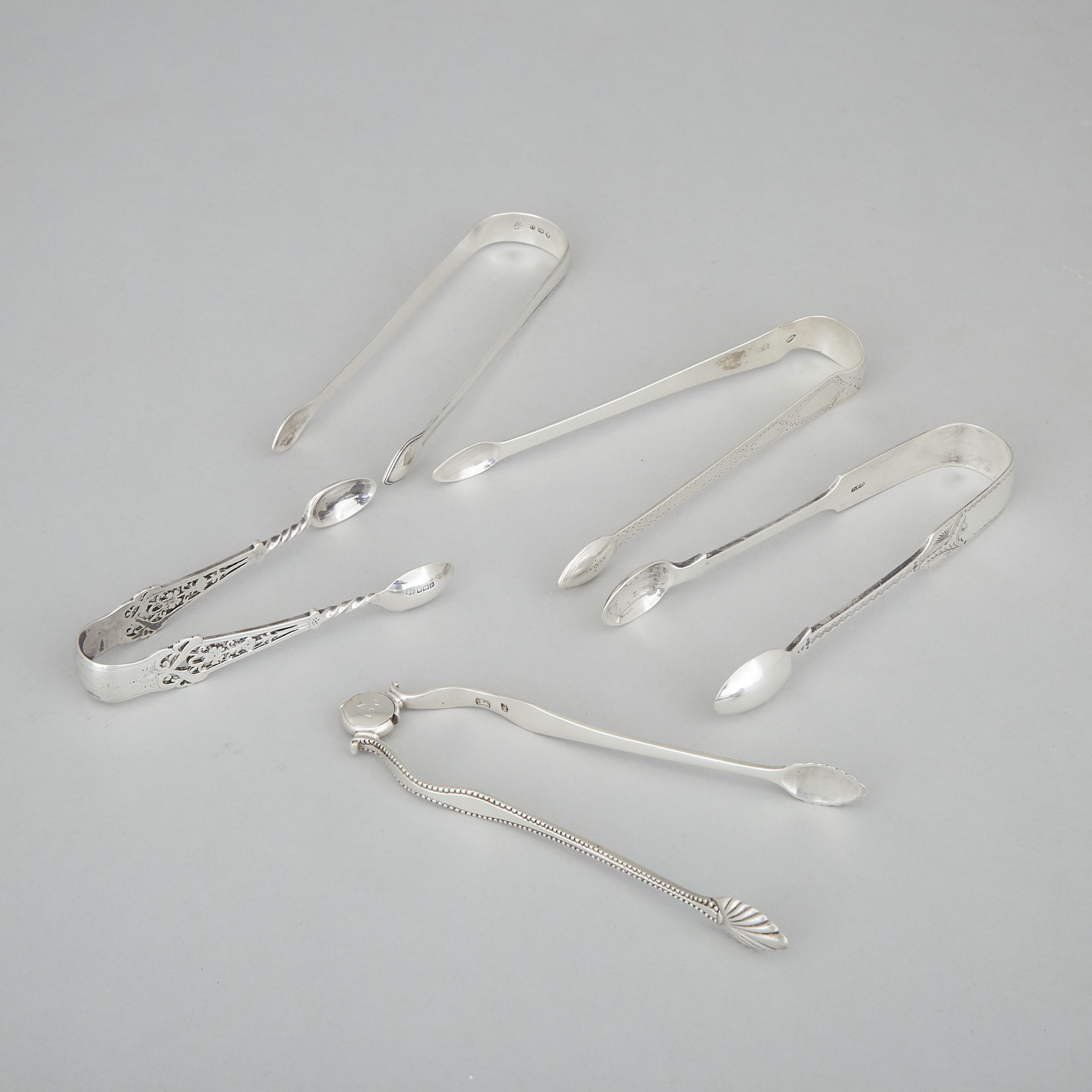 Five George III and Later Silver Sugar Tongs, mainly London, 1793-1907