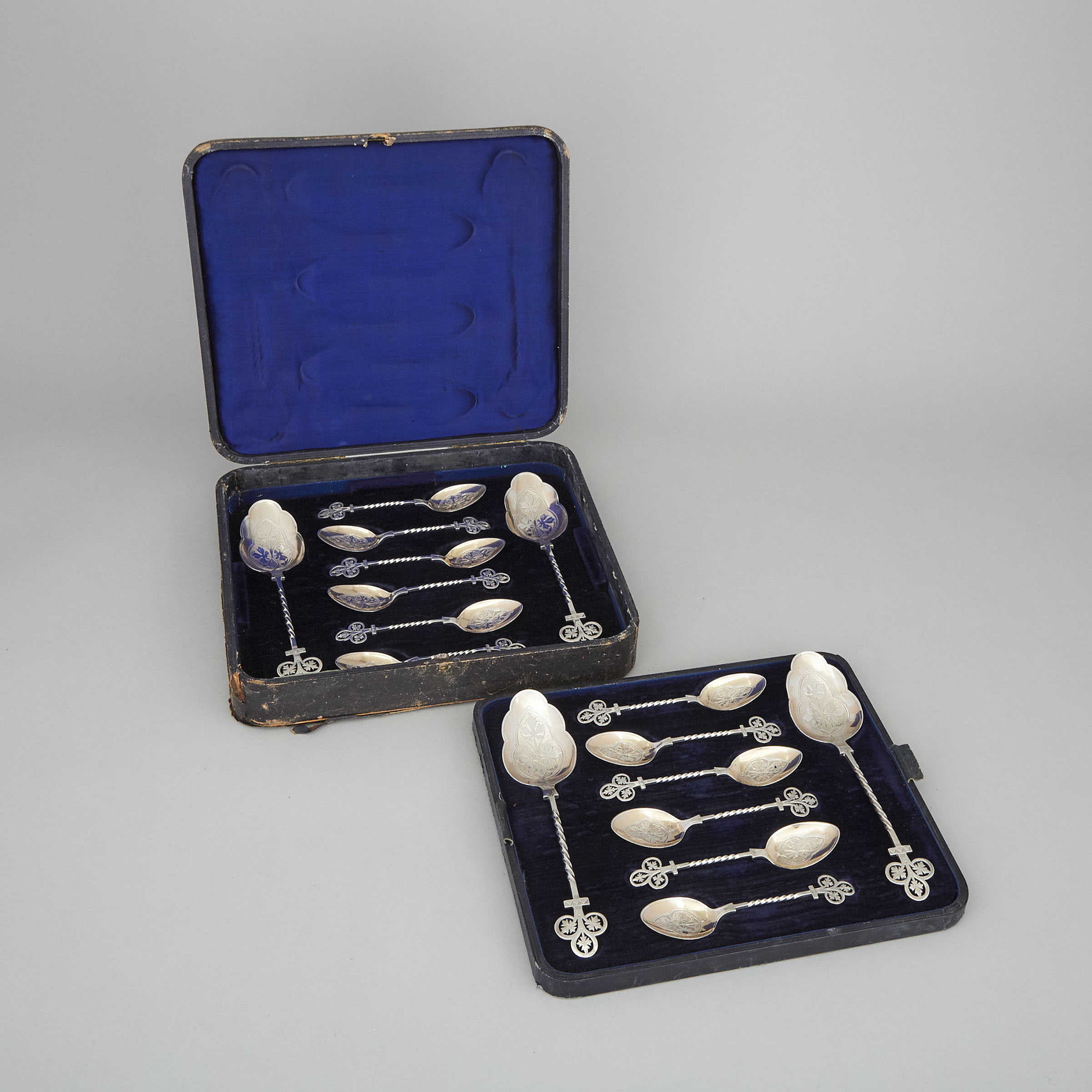 Twelve Victorian Silver Dessert Spoons and Four Serving Spoons, probably Charles Favell, Sheffield, 1869