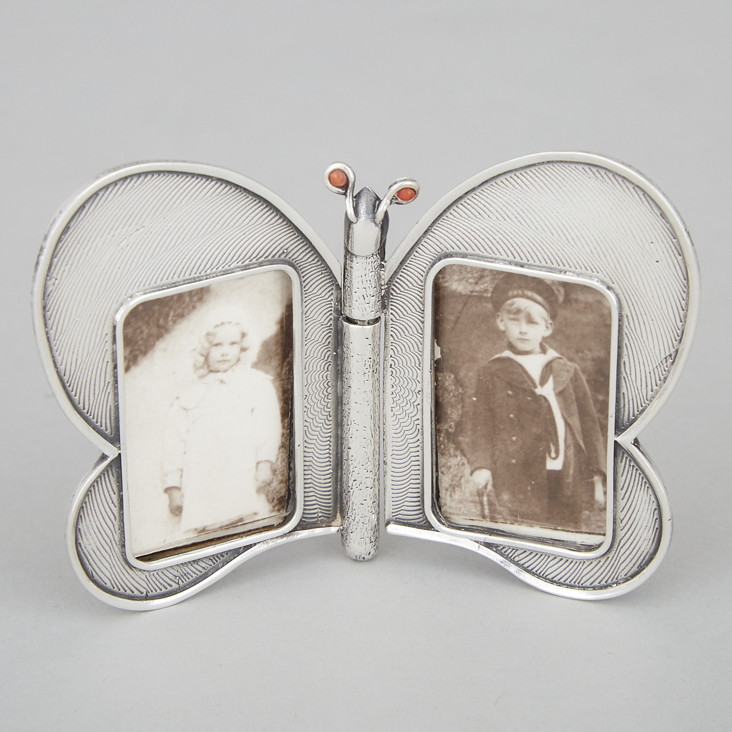 English Silver Butterfly-Form Small Double Photograph Frame, Kate Shea, London, 1982