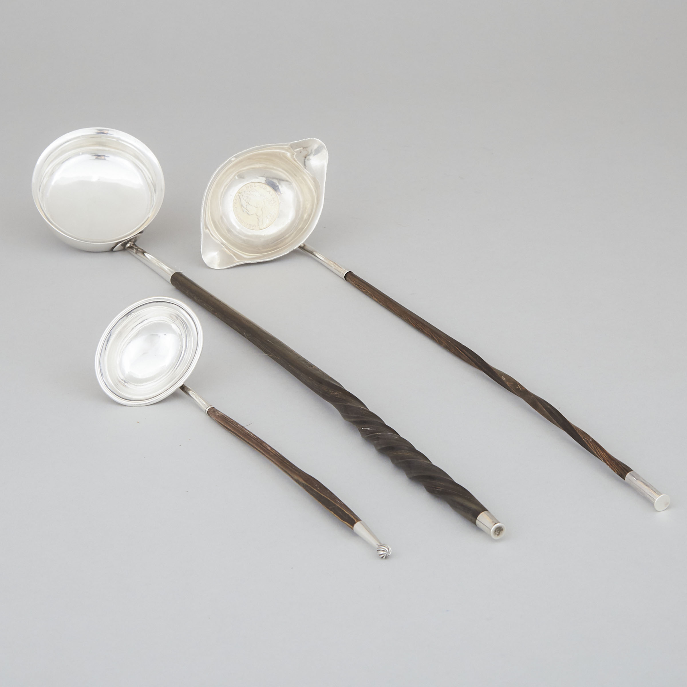 Two George III Silver Toddy Ladles and a Cream Ladle, c.1800
