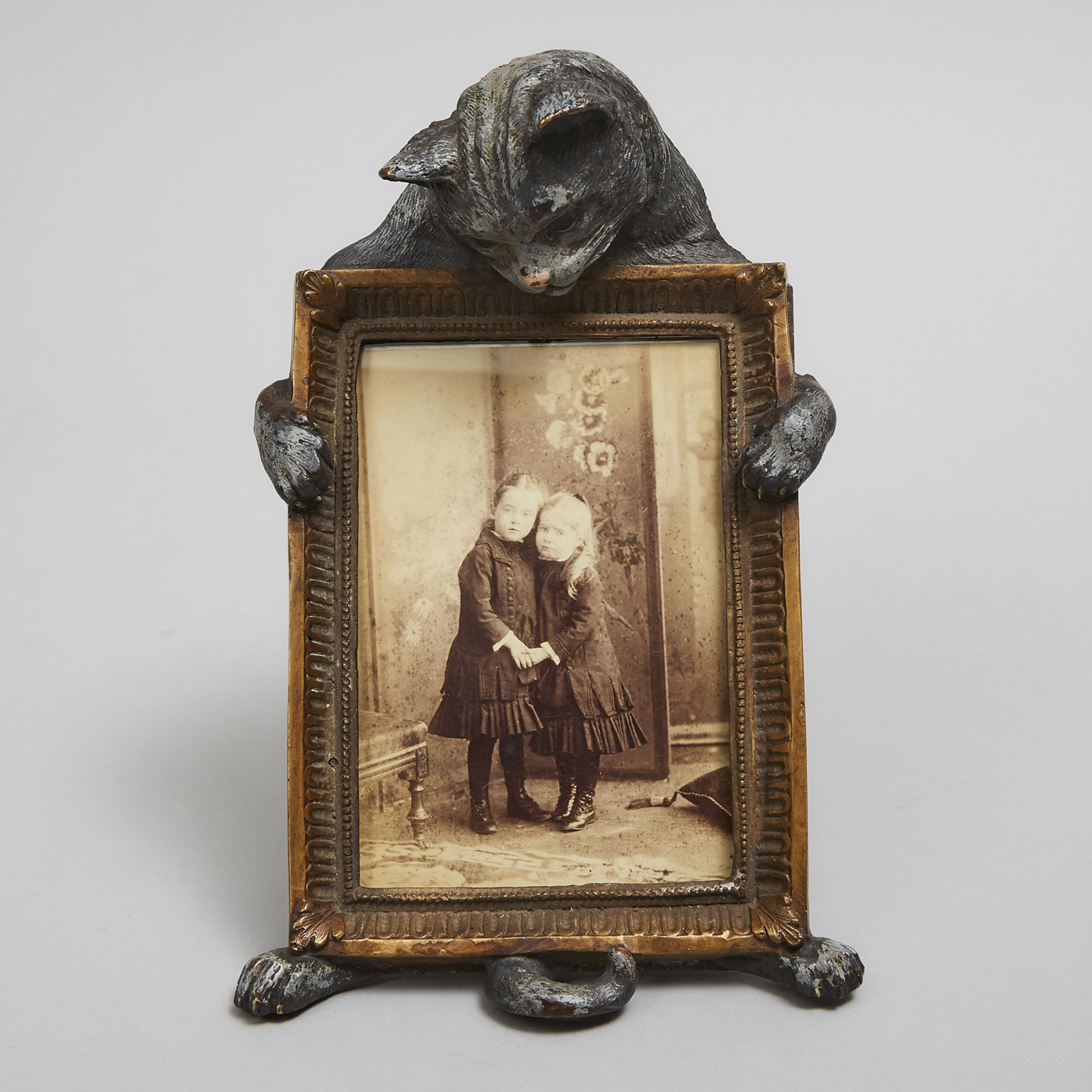 Austrian Cold Painted Bronze Cat Form Frame with a Victorian Albumin Print Portrait of Two Young Girls, 19th and 20th centuries