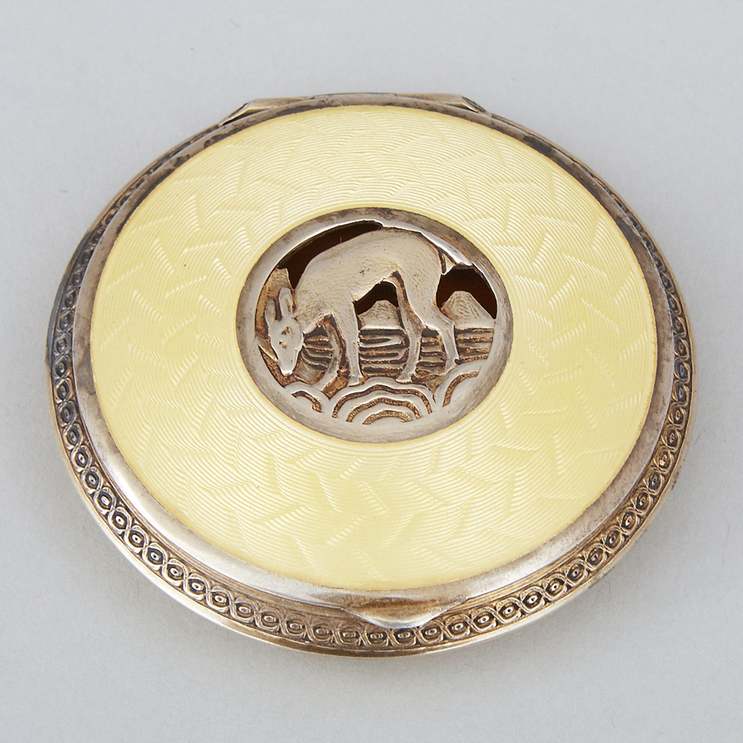 Continental Silver and Yellow Enamel Circular Compact, 20th century