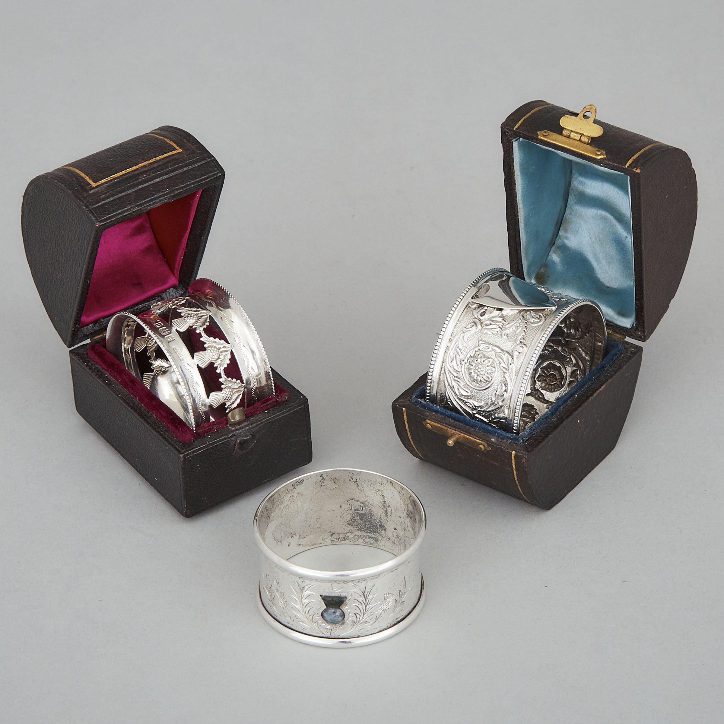 Three Victorian and Later Silver Napkin Rings, George Unite, Birmingham, 1883, Alfred George Griffiths, 1903 and Joseph Cook & Son, 1928