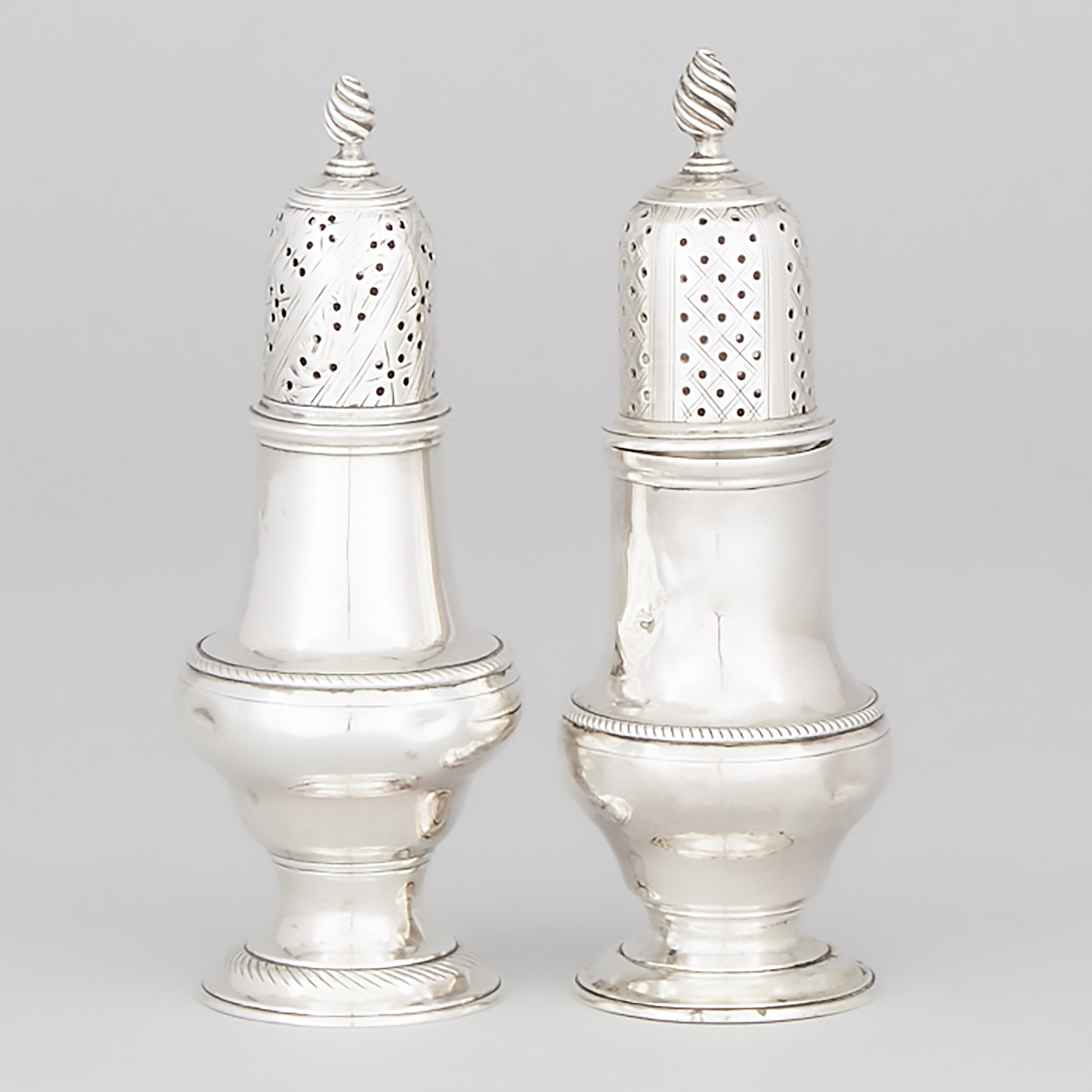 Two George III Silver Baluster Casters, Richard Palmer I, London, 1767 and Thomas Daniell and John Delmester, 1774