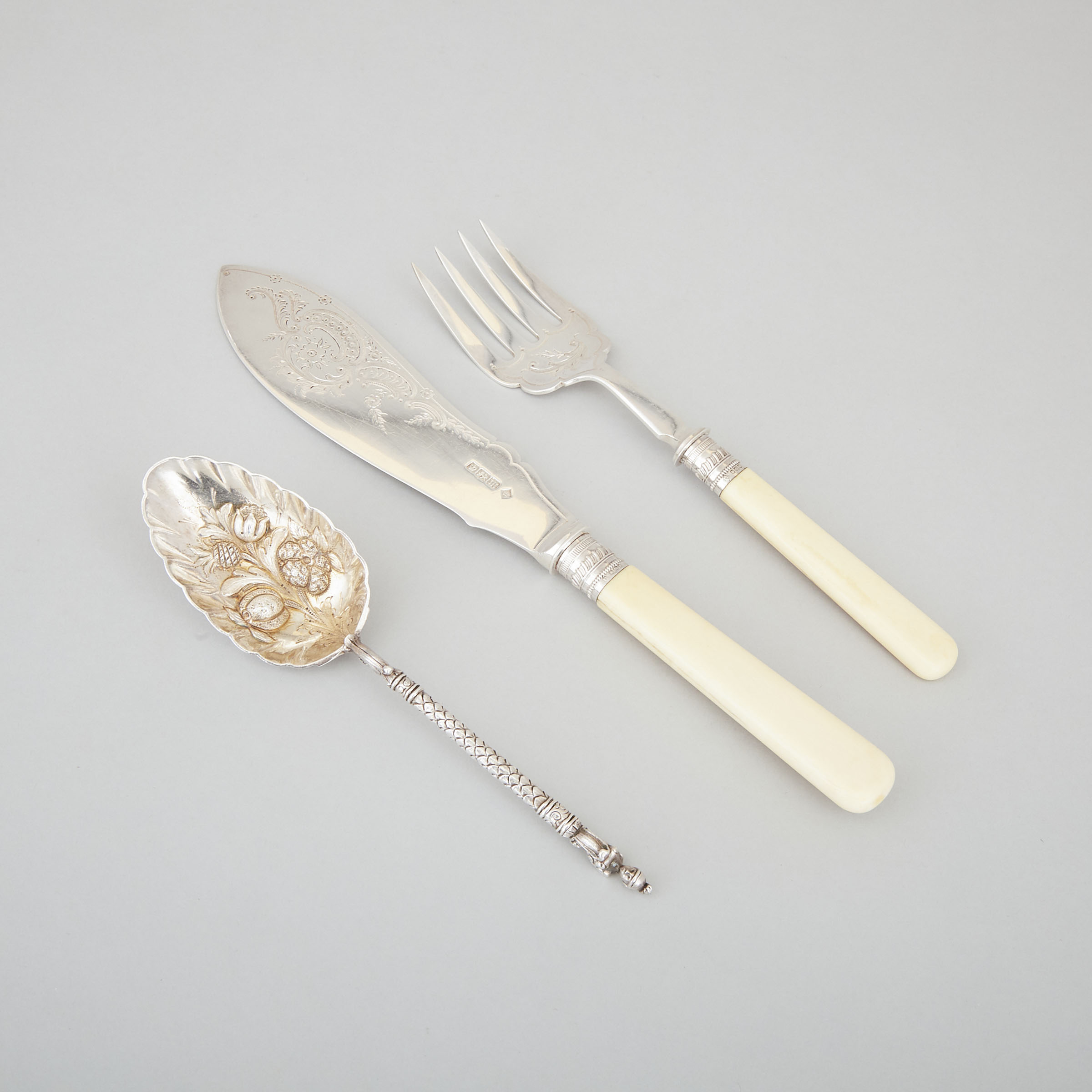 Victorian Silver Berry Spoon, William Hutton & Sons, London, 1883 and a Pair of Edwardian Silver Fish Servers, Martin & Hall, Sheffield, 1904