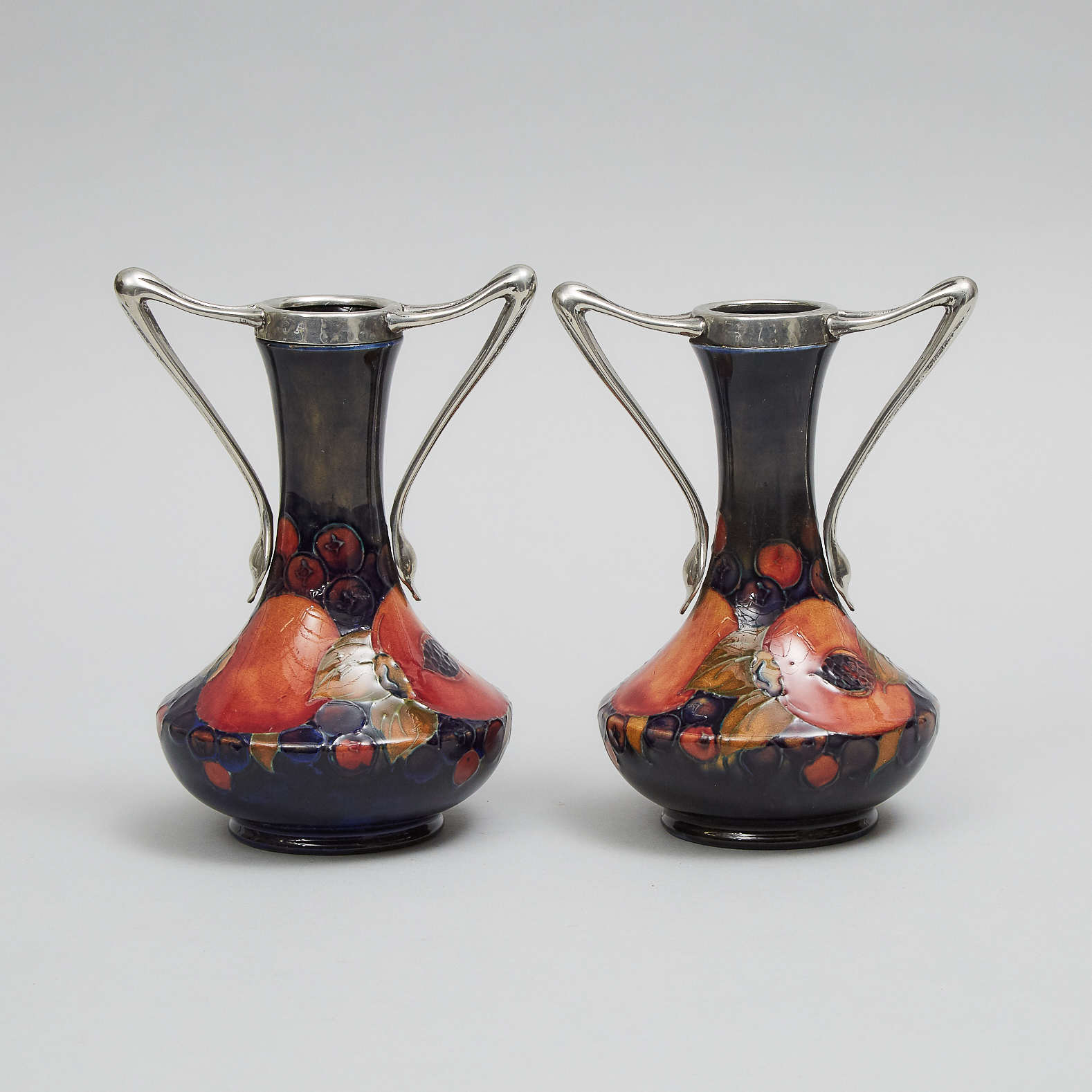 Pair of Moorcroft Pewter Mounted Two-Handled Pomegranate Vases, c.1925
