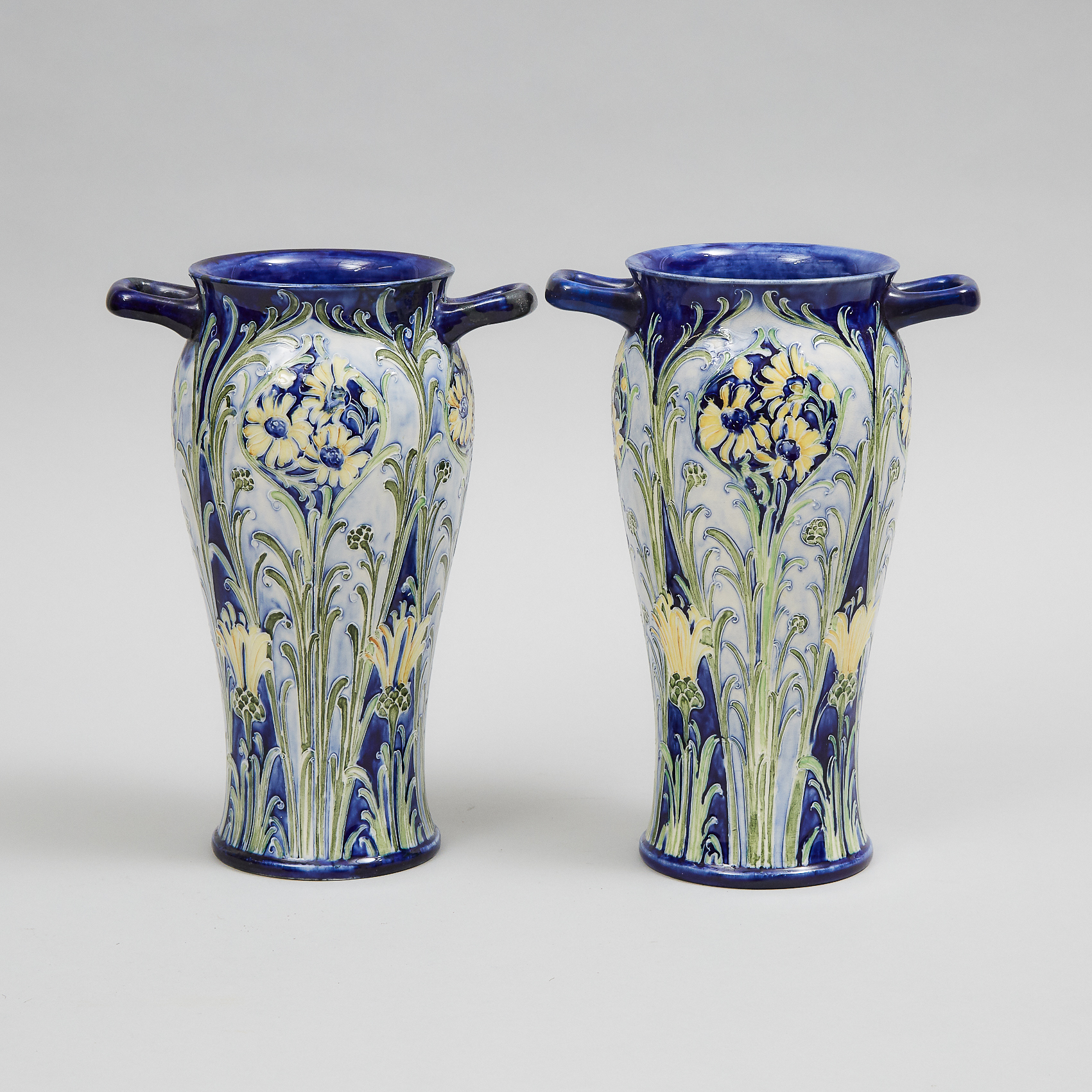 Pair of Macintyre Moorcroft Florian Cornflower Two-Handled Vases, c.1902