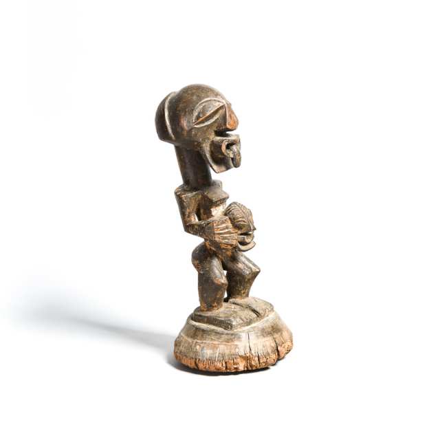 Songye Carved Wood Male Figure, Central Africa