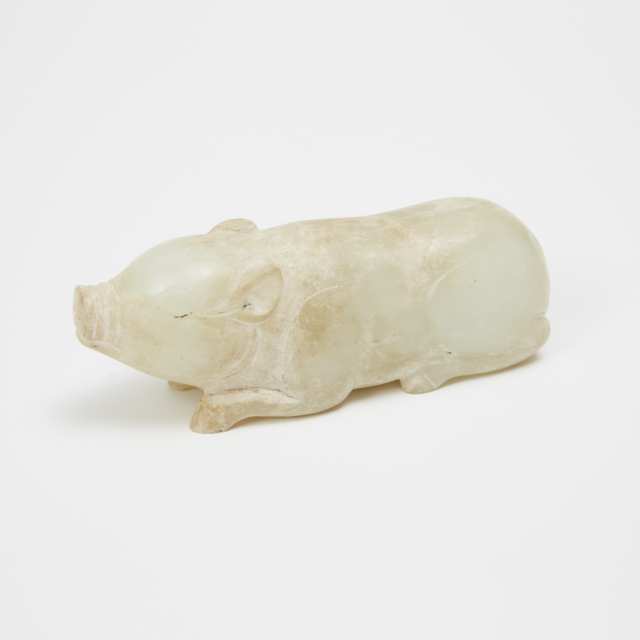 A White and Russet Jade Carving of a Pig