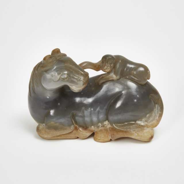A Large Grey and Russet Jade Carved 'Horse and Monkey' Group