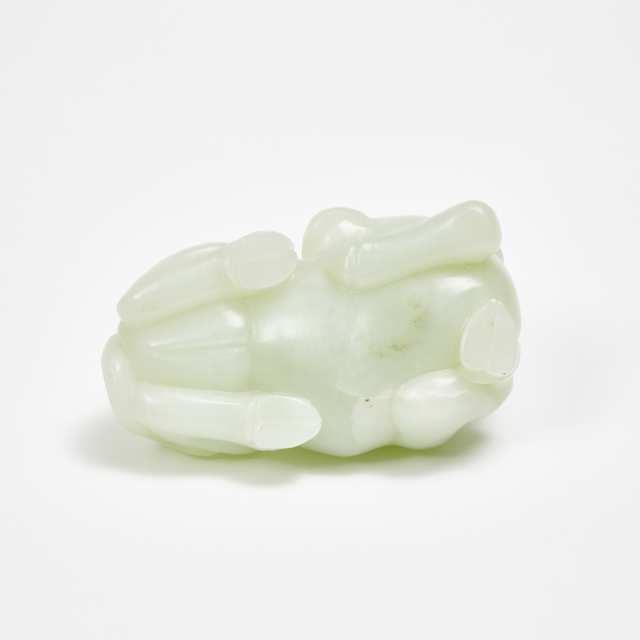 A Celadon White Jade Carving of a Recumbent Buffalo