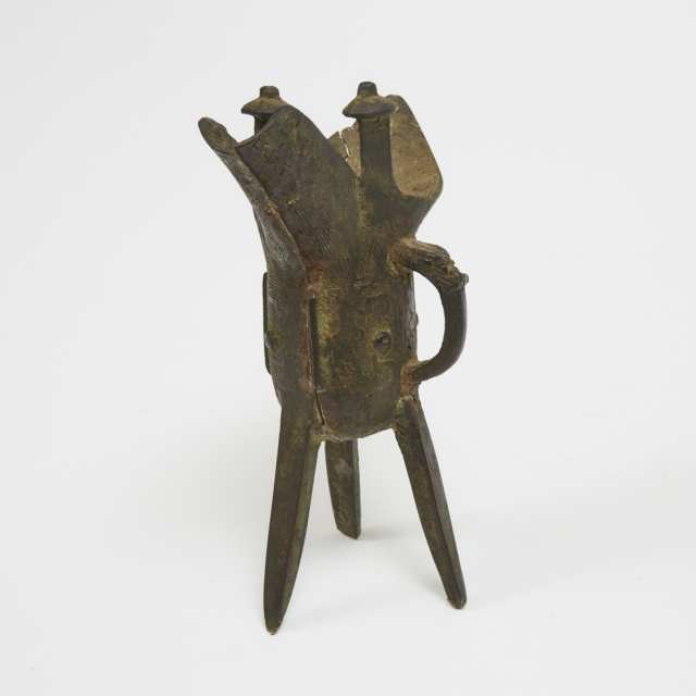 A Bronze Ritual Tripod Wine Vessel, Jue 