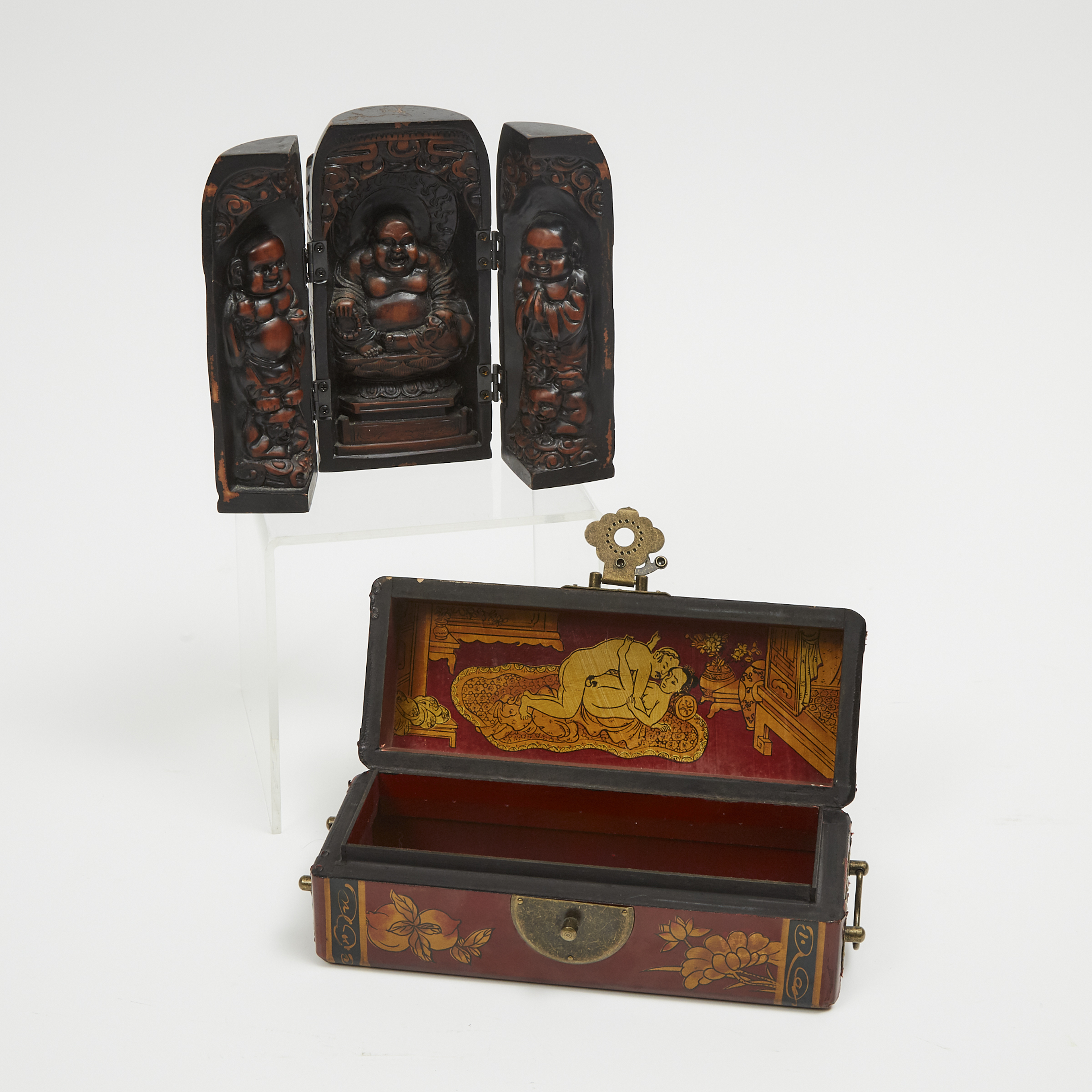 A Japanese Red Lacquer Pillow-Form 'Erotic' Box, together with a Folding Triptych Buddhist Travel Altar