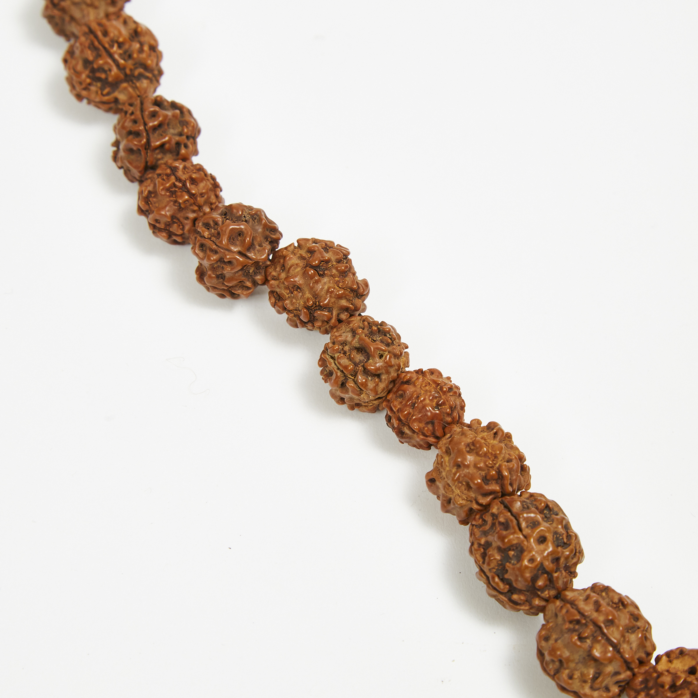 A Chinese Carved Walnut Beaded Necklace, 19th Century