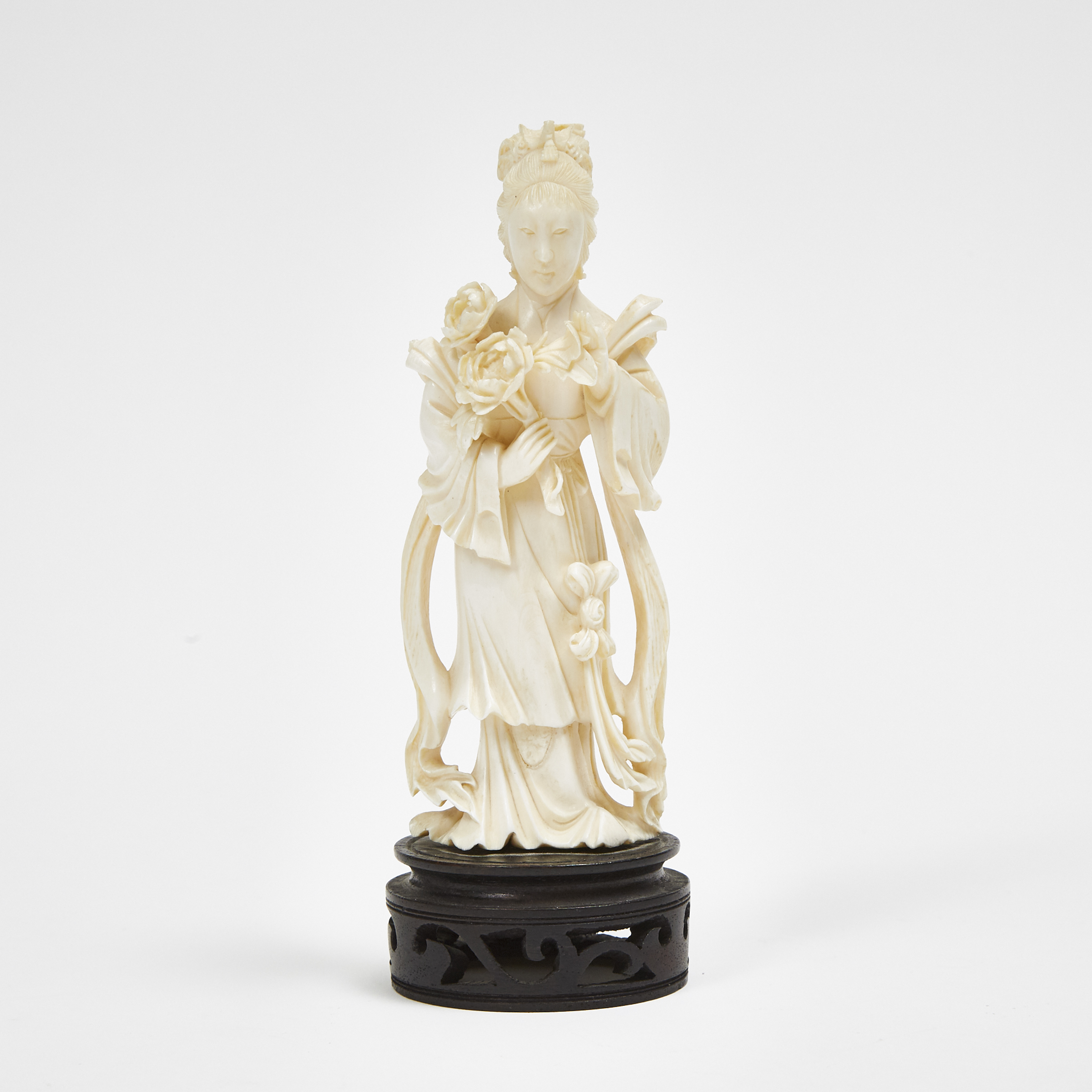 An Ivory or Composite Carved Lady with Flowers