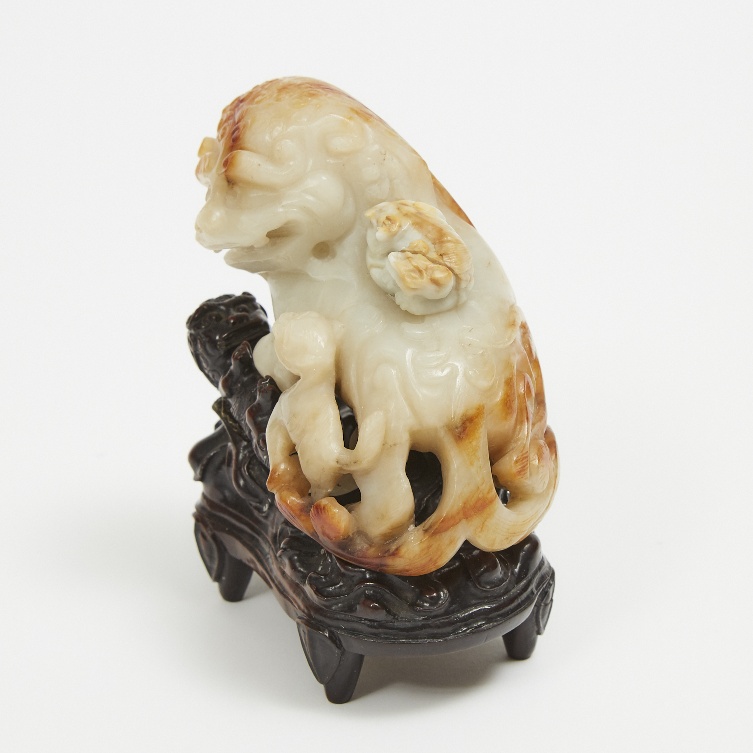 A Beige Jade Carvings of Lions