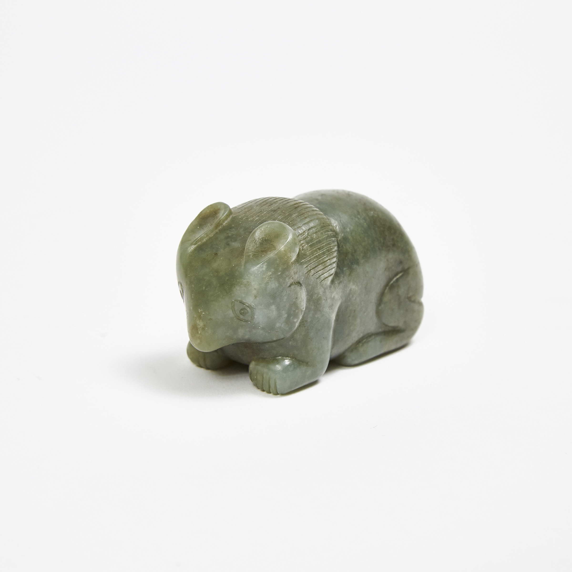 A Carved Celadon Jade Bear