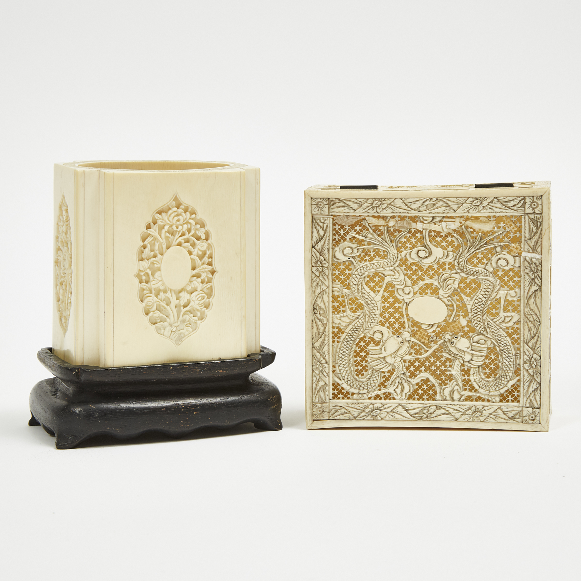 A Rectangular Ivory Carved Floral Paneled Brushpot with Stand, together with a Reticulated Ivory Jewellery Box